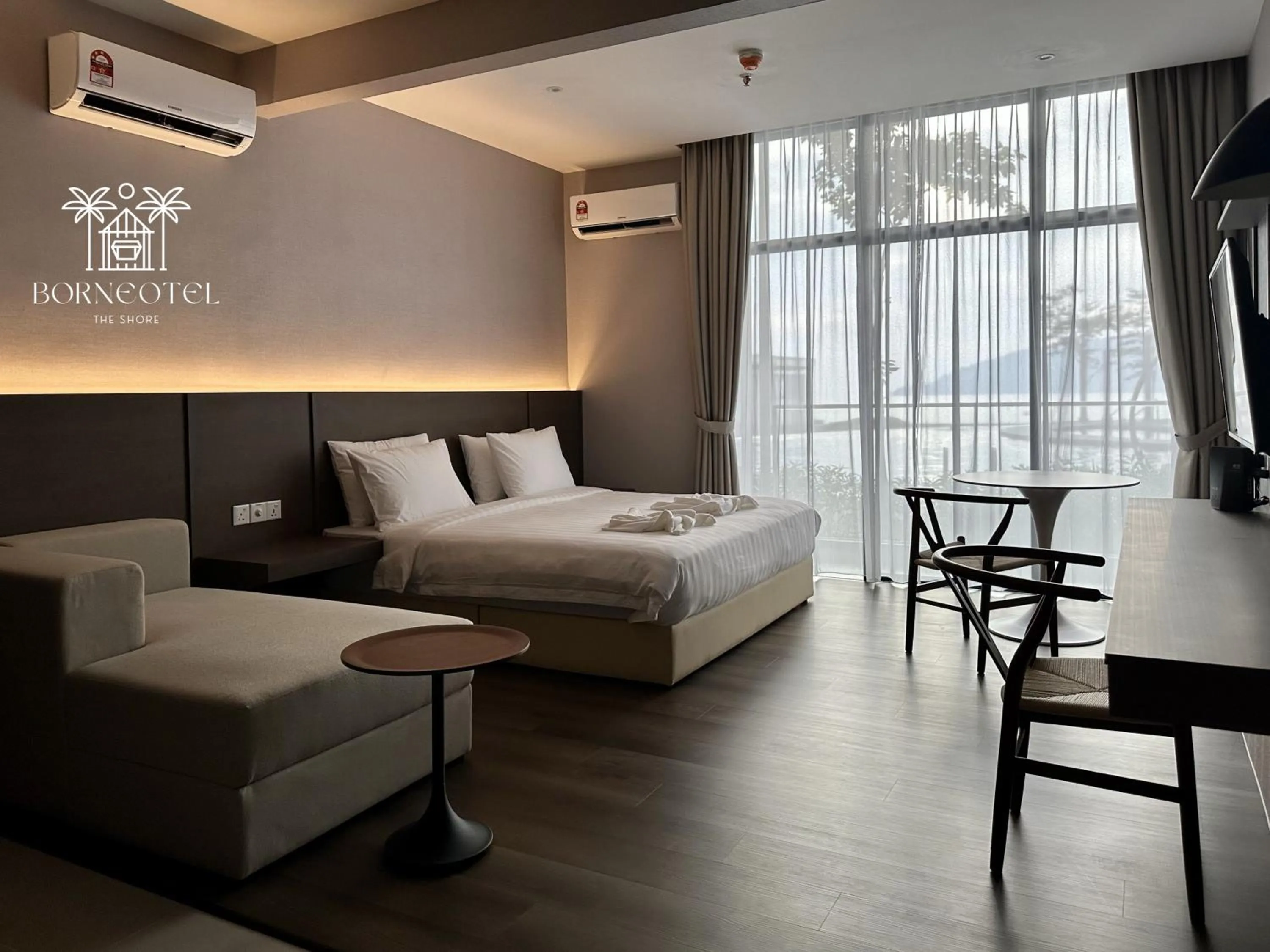 Bedroom, Bed in Borneotel The Shore KK by CHG