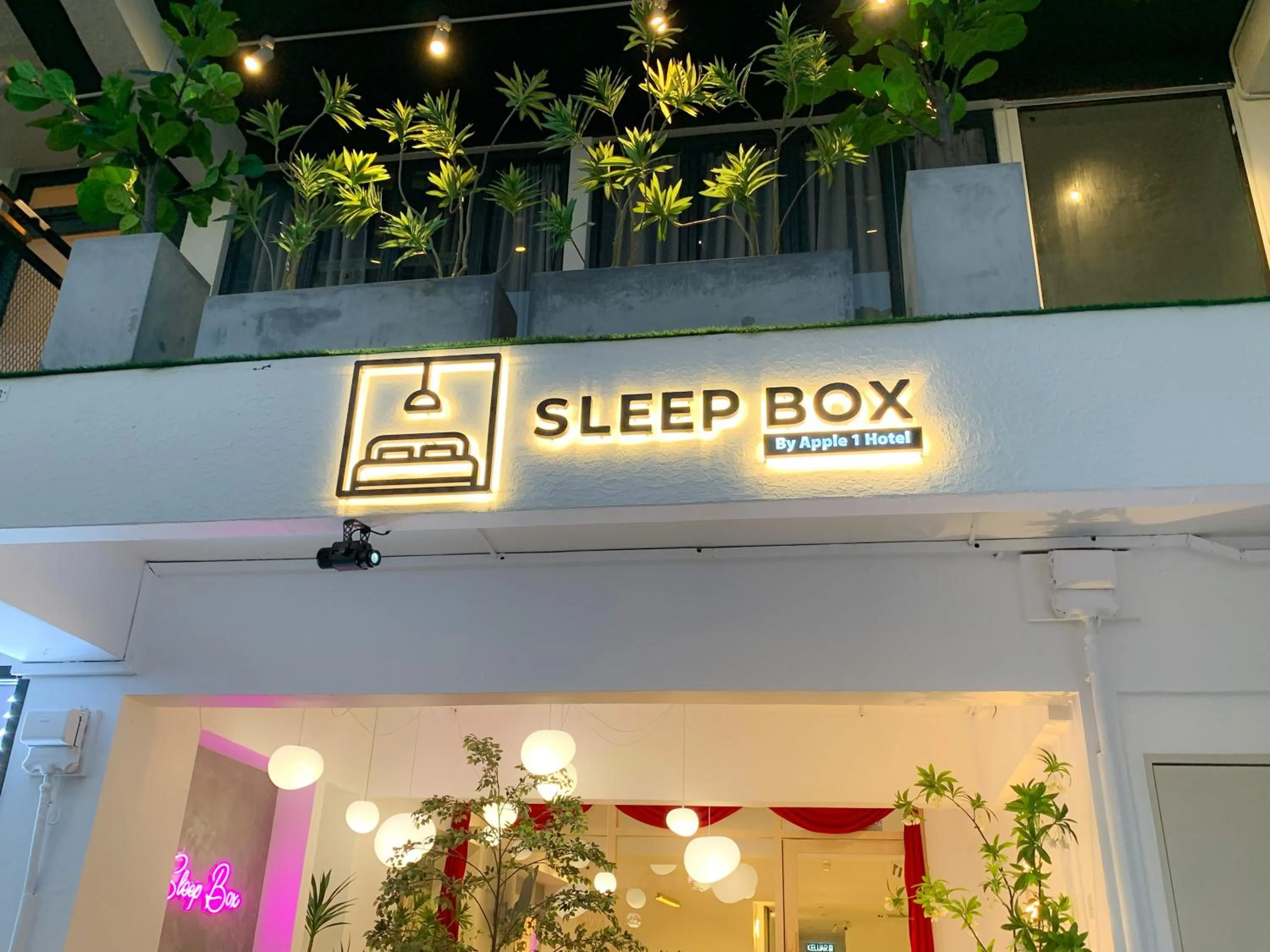 Property logo or sign in Sleep Box Penang