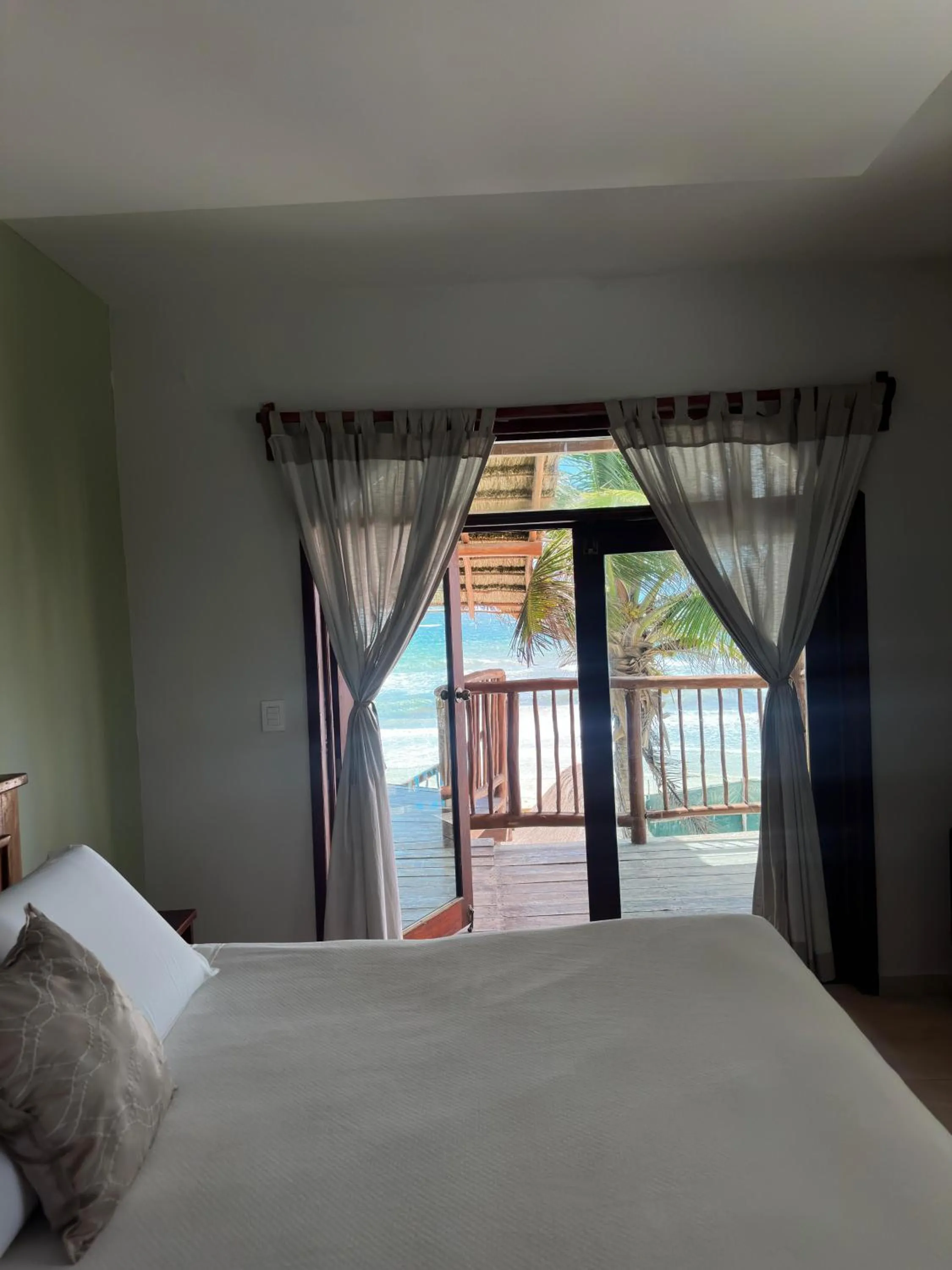 Balcony/Terrace, Bed in Playa Canek Beachfront Eco Hotel