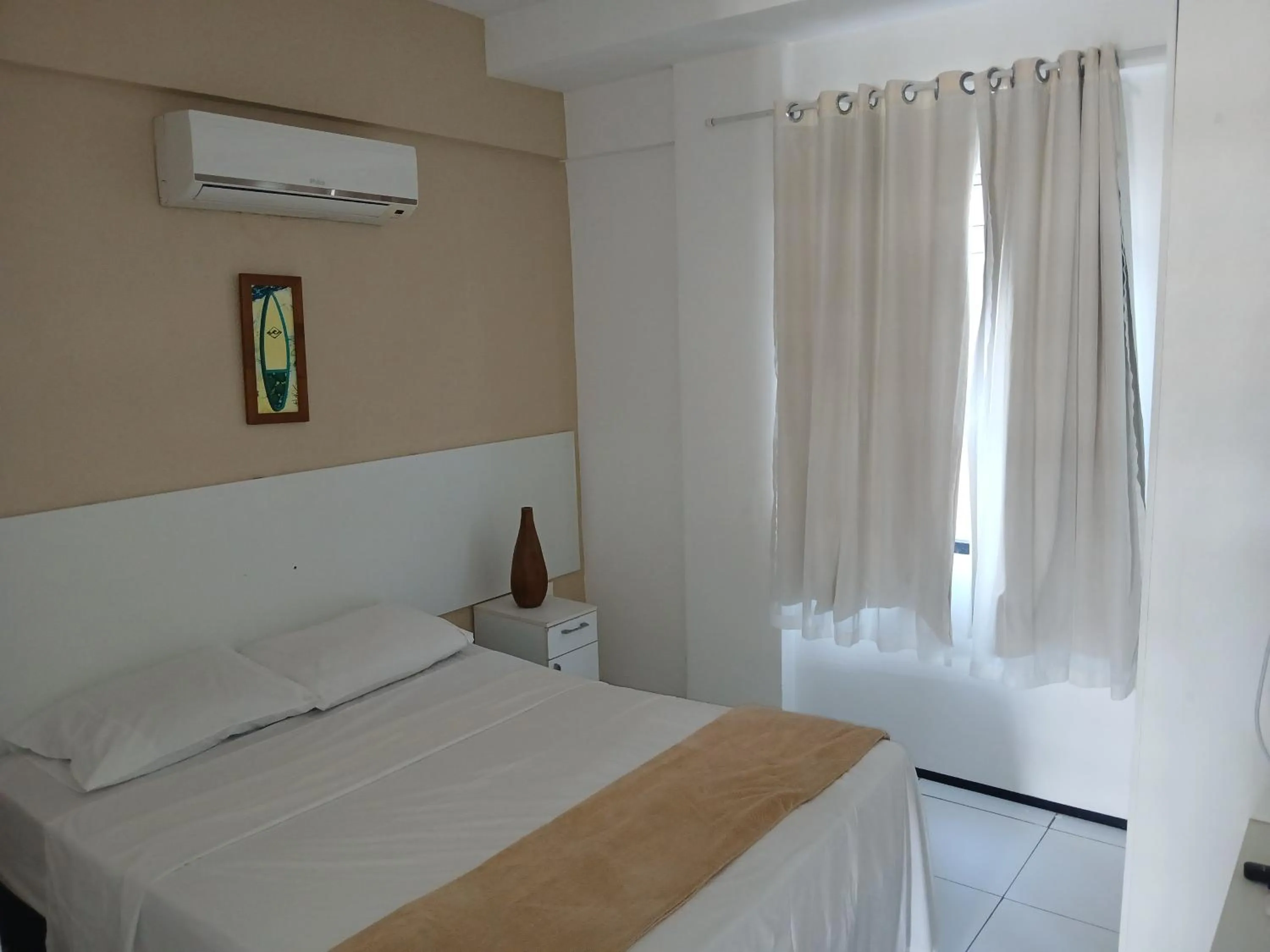 Bed in Brisa Brasil Residence