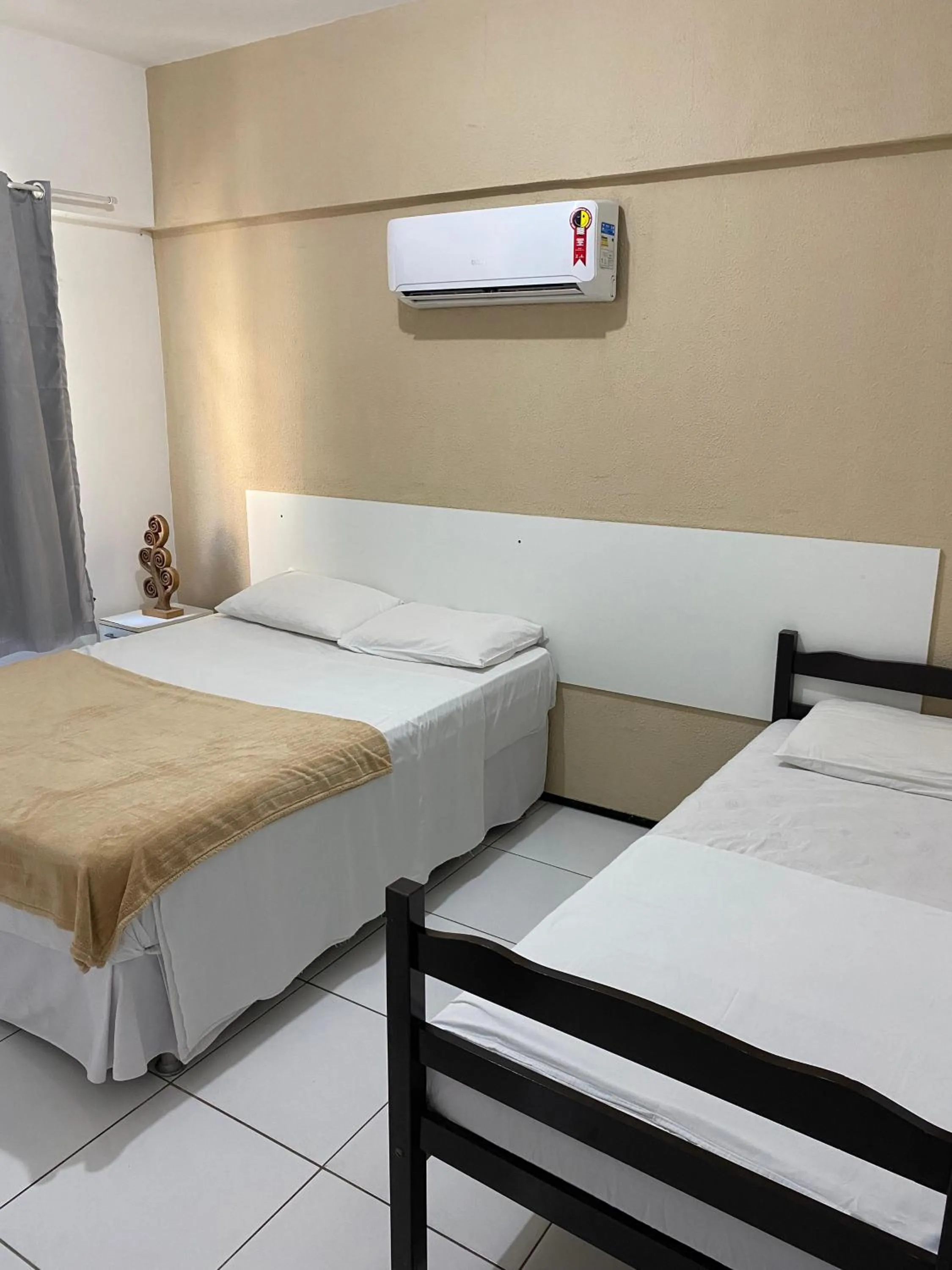 Bed in Brisa Brasil Residence