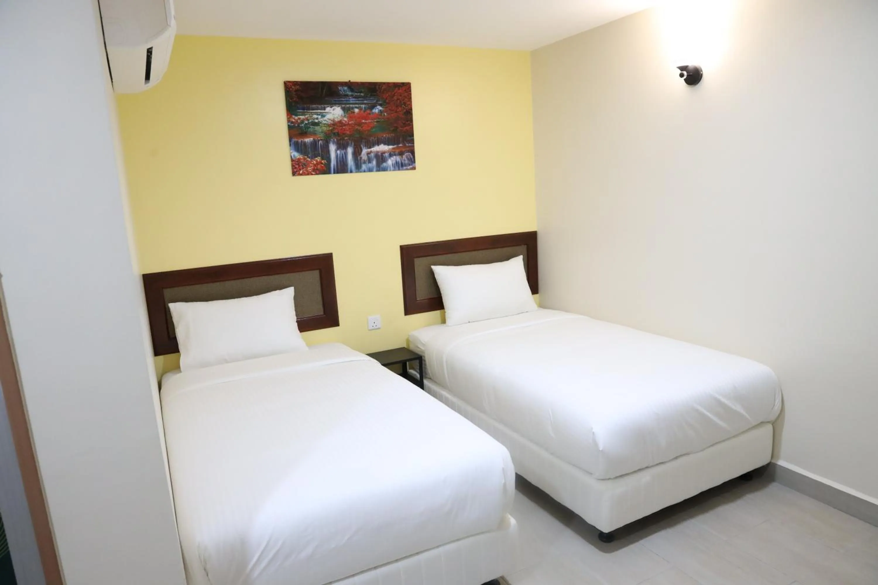 Bedroom, Bed in Capital O 90897 Island City Hotel