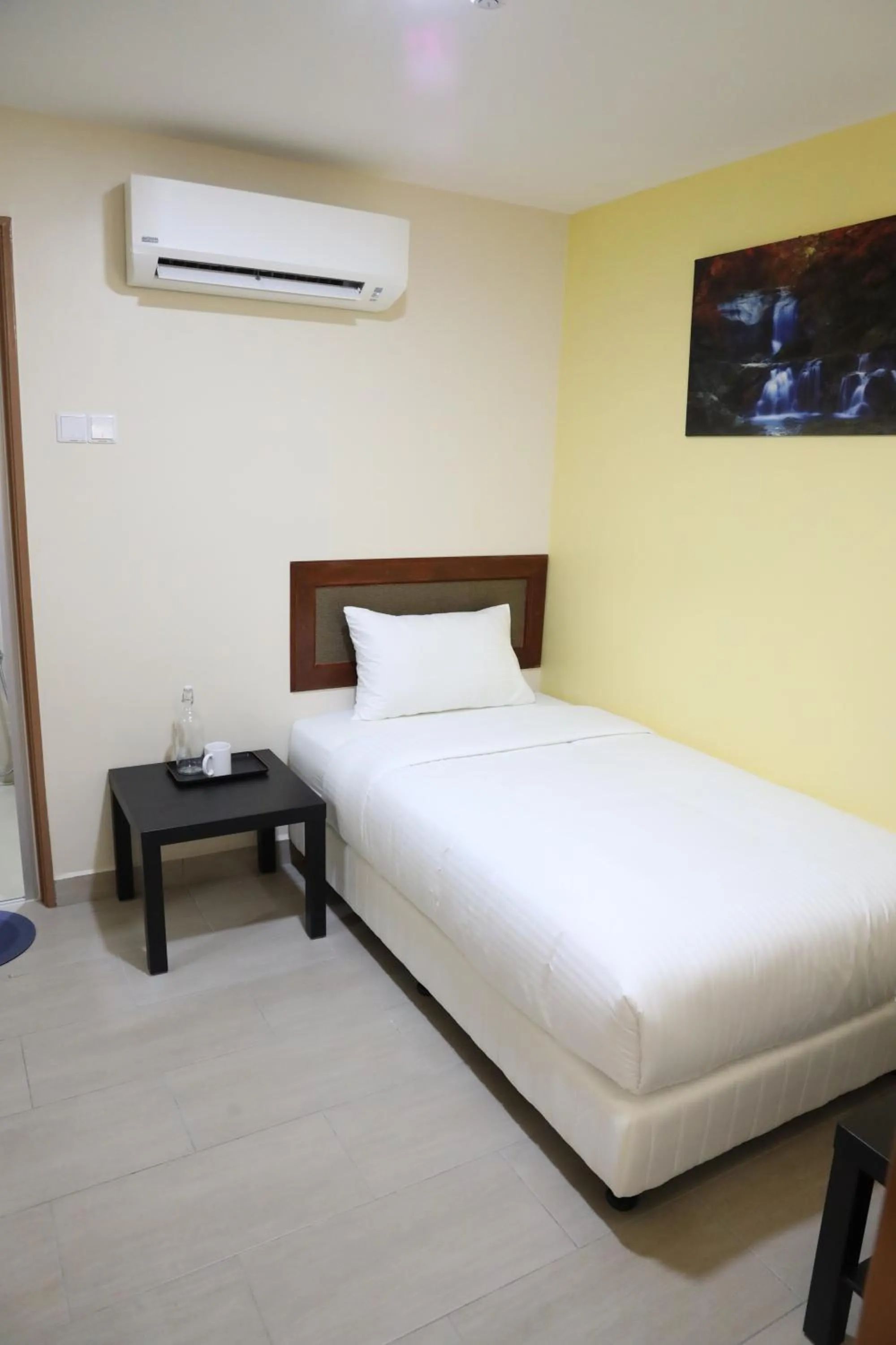 Bedroom, Bed in Capital O 90897 Island City Hotel