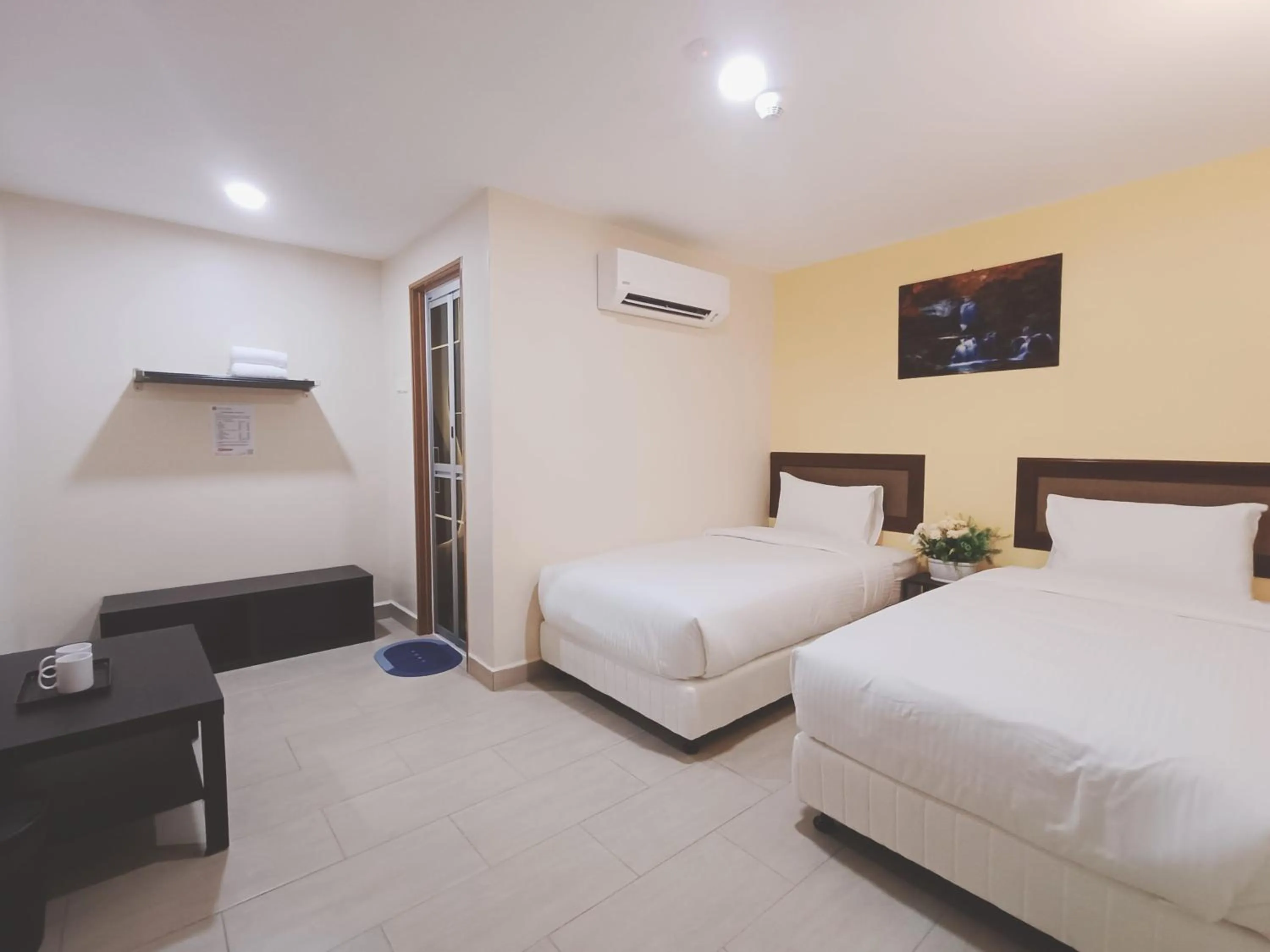 Bedroom, Bed in Capital O 90897 Island City Hotel