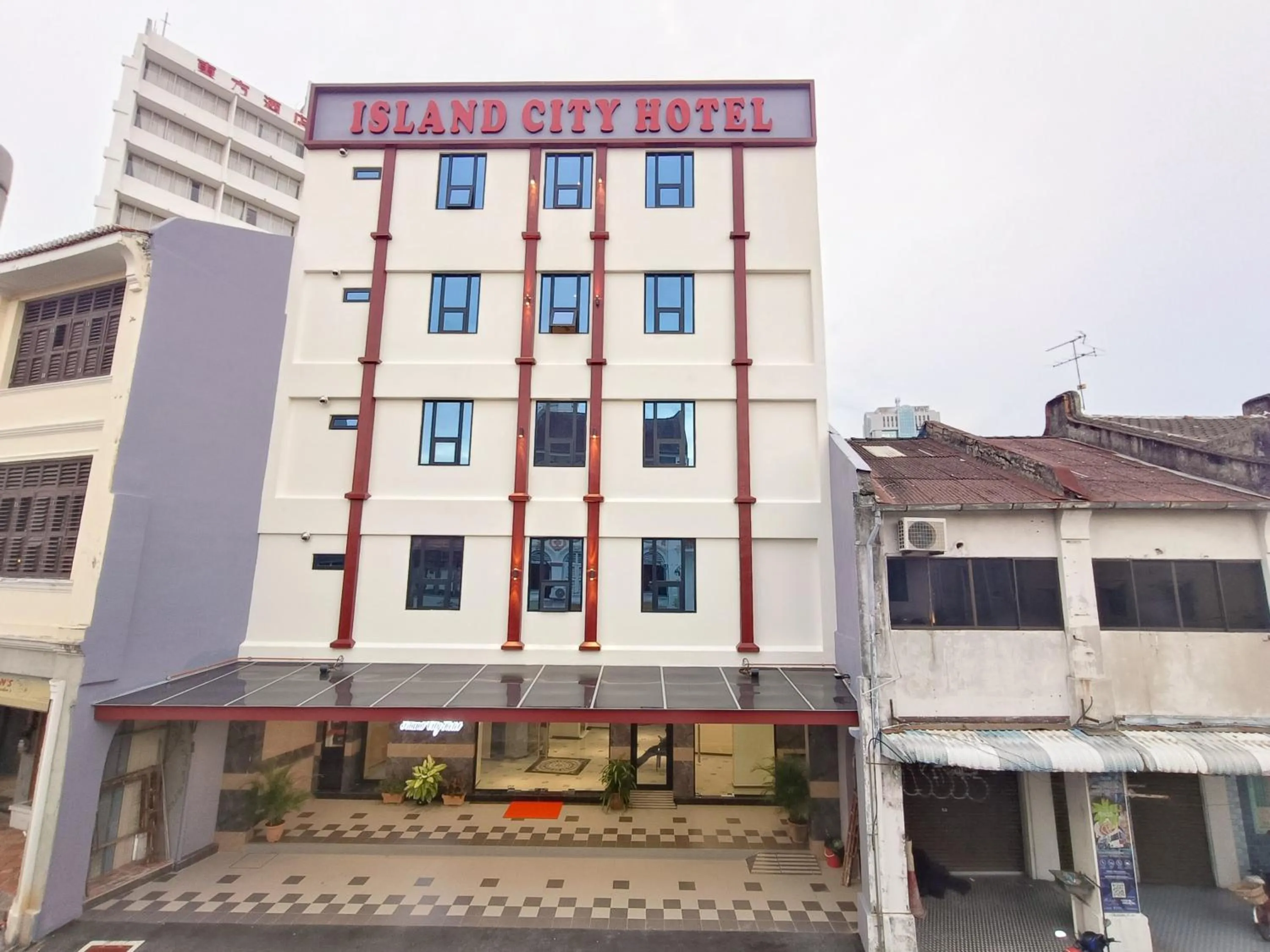 Facade/entrance in Capital O 90897 Island City Hotel