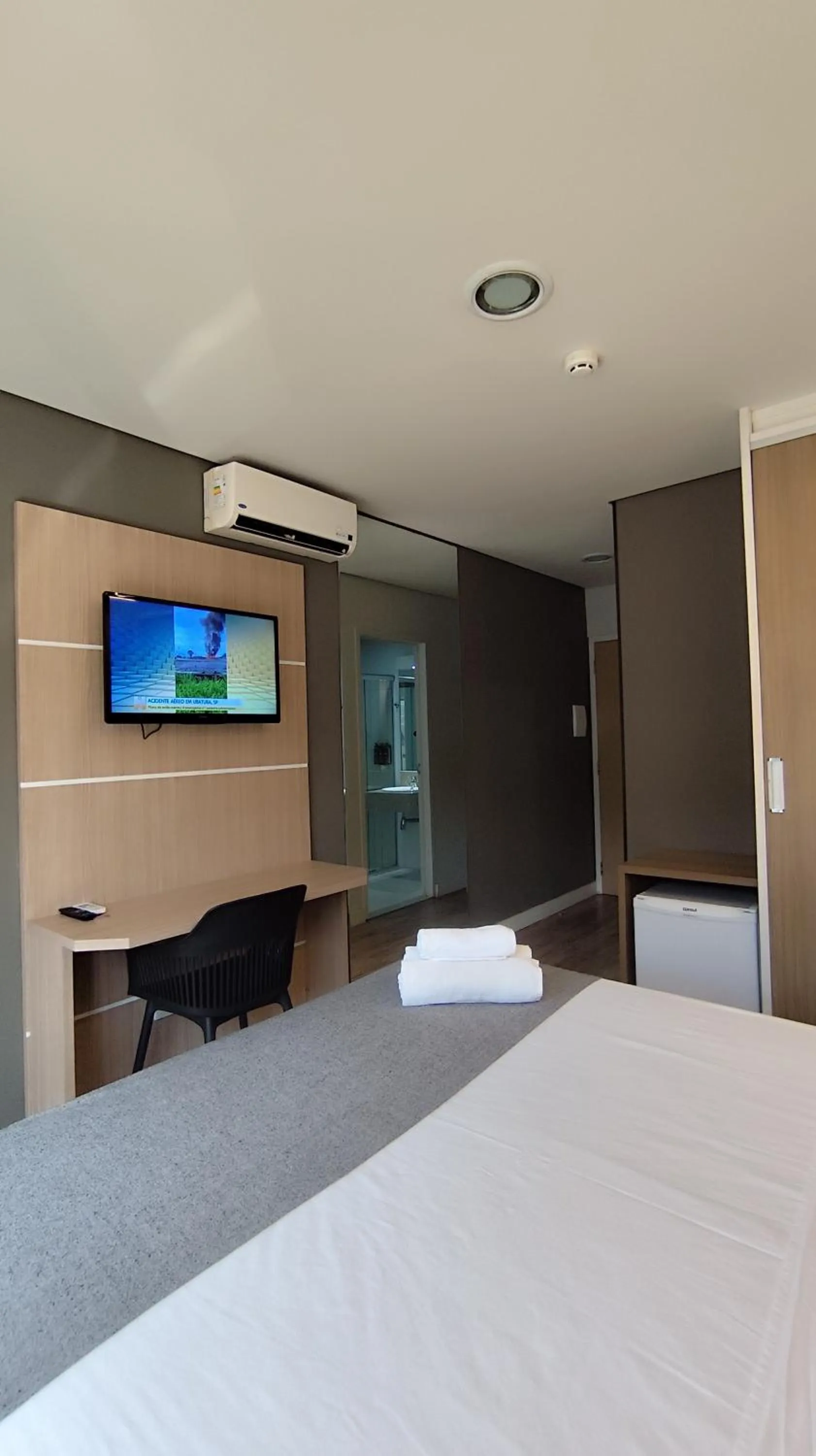 Bed in Assay Plaza Hotel