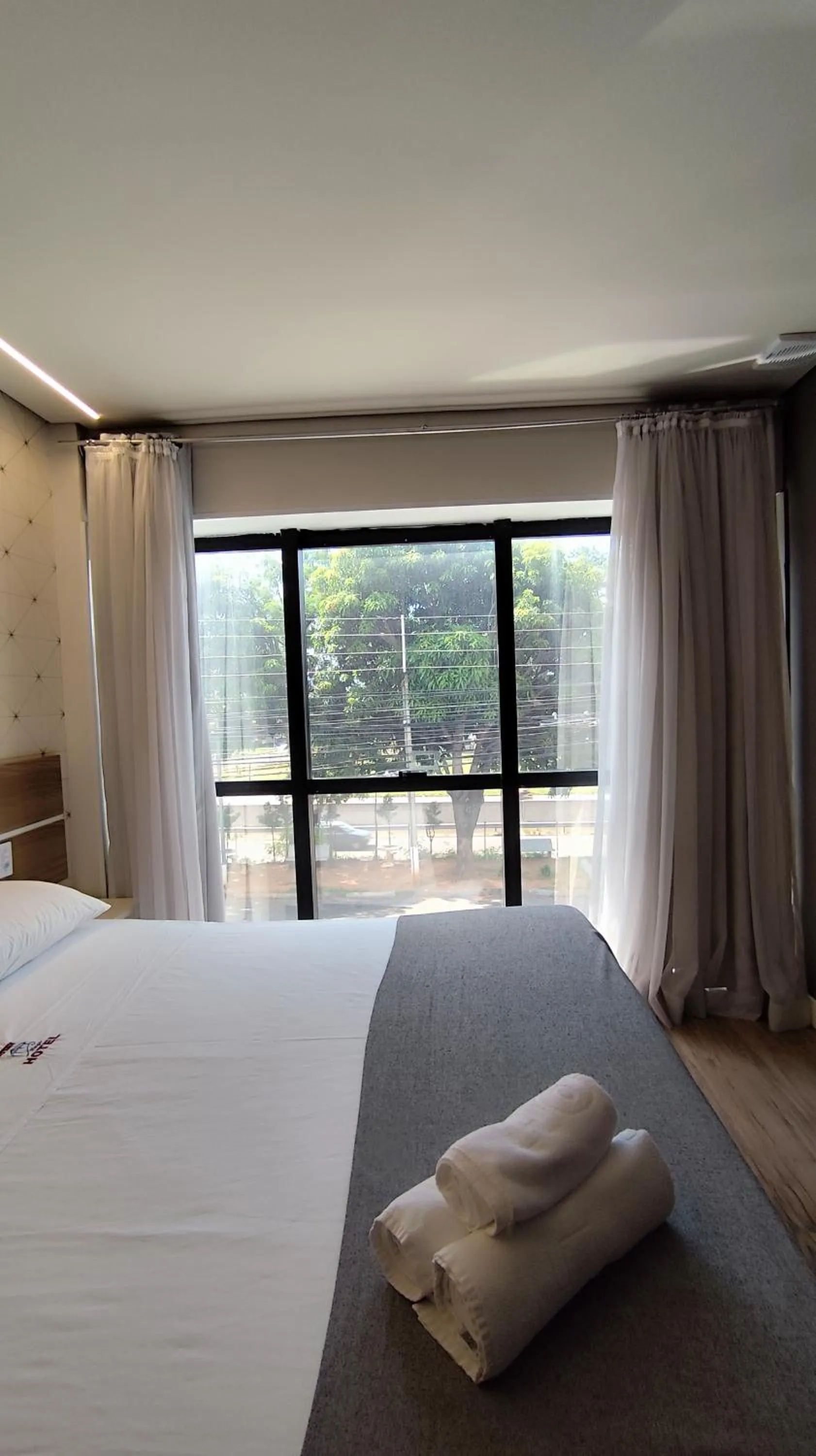 Bed in Assay Plaza Hotel