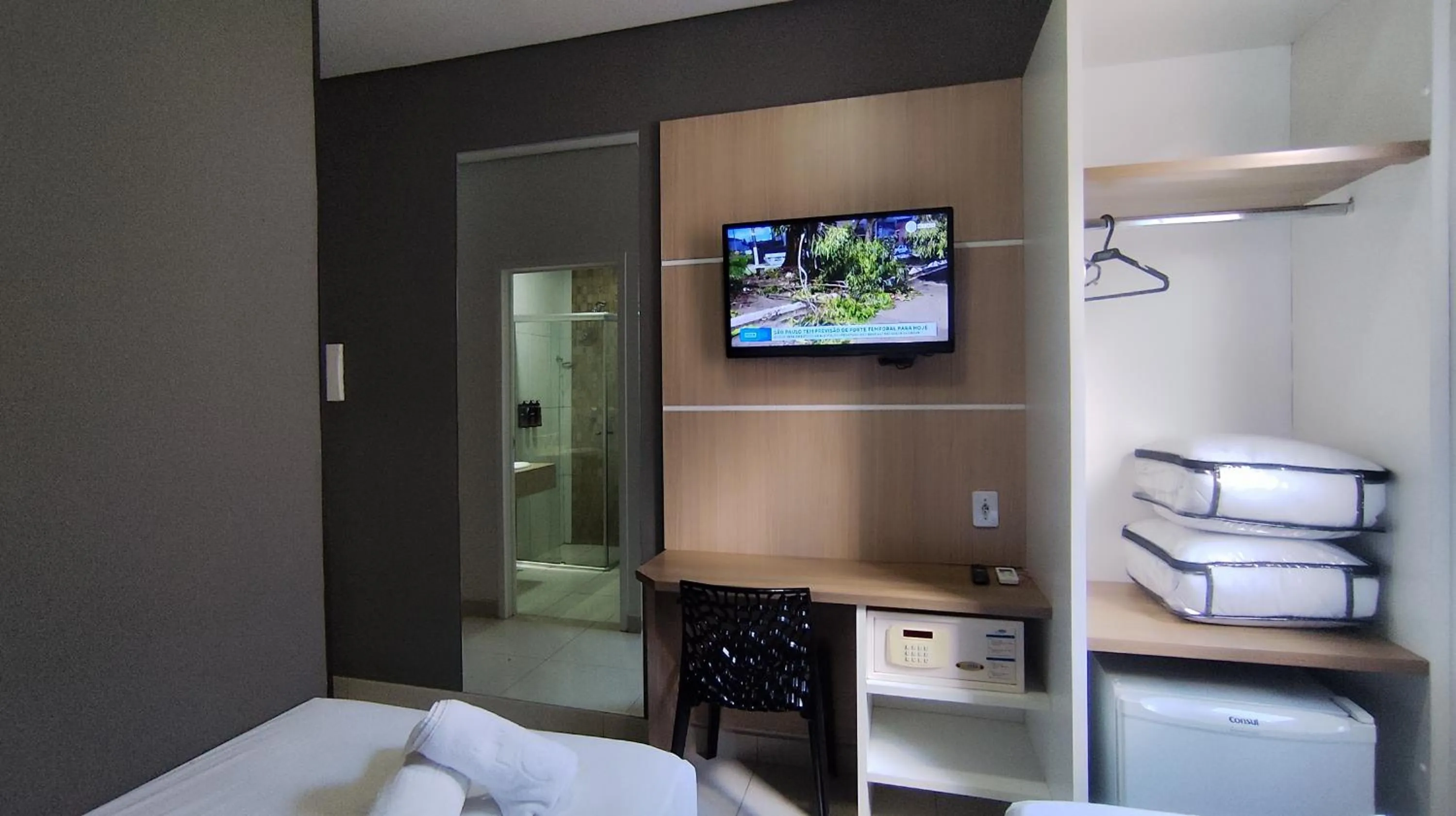 Bed in Assay Plaza Hotel