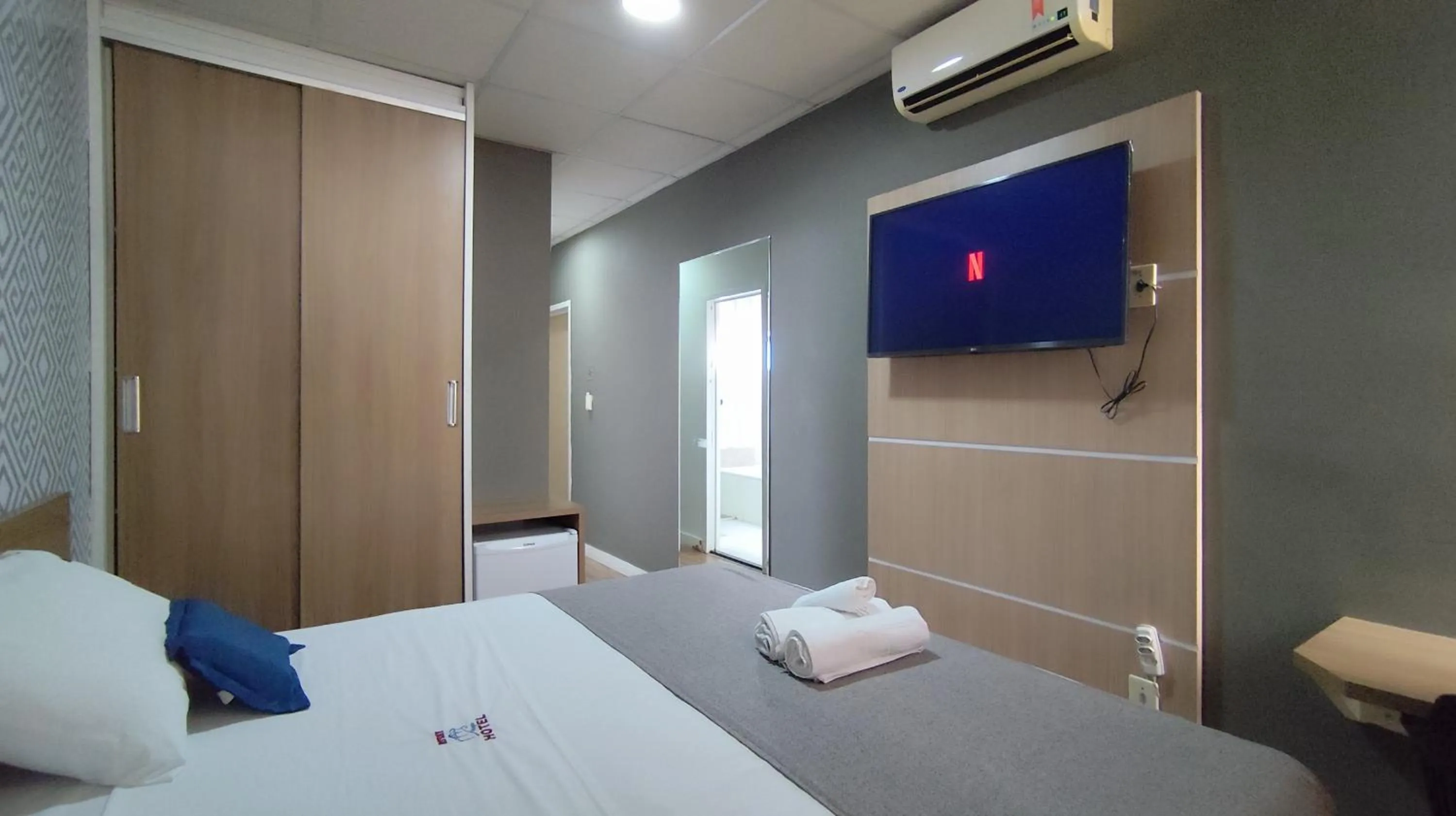 Bed in Assay Plaza Hotel