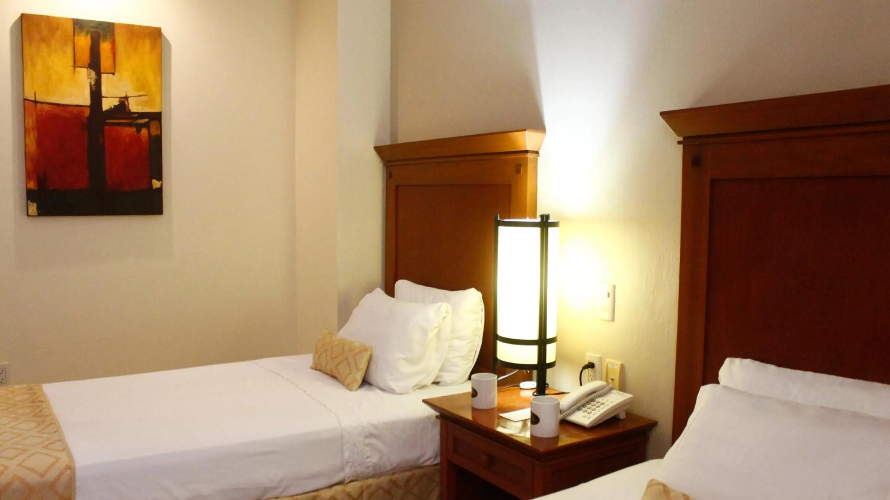 Bed in Hotel Magno Tepatitlán