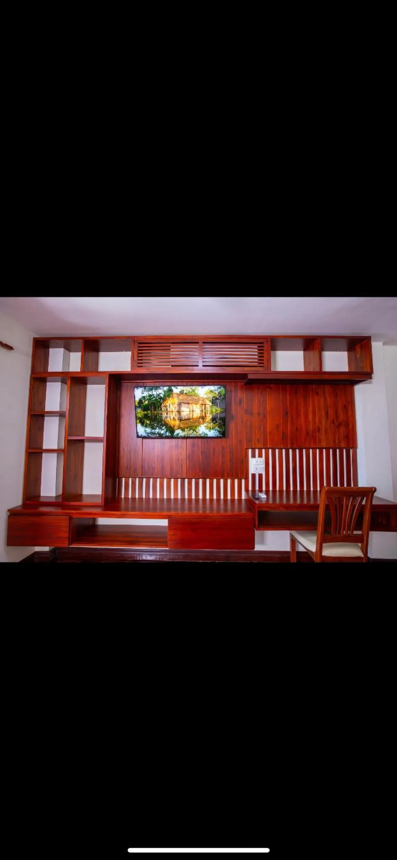 Communal lounge/ TV room in Phongsavath Boutique Hotel