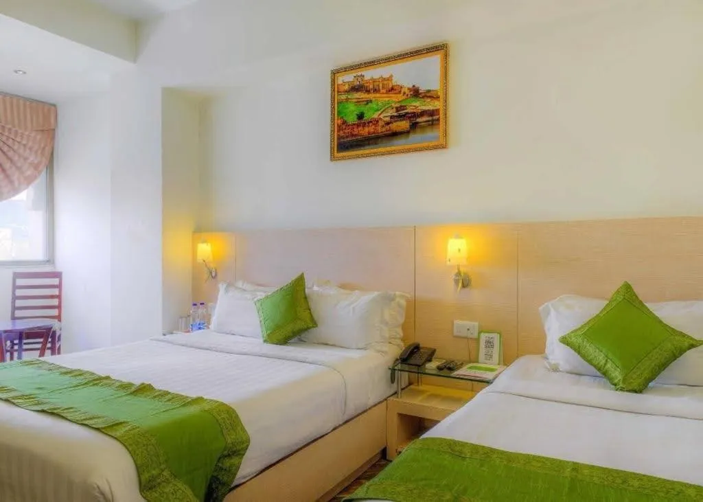 Bed in Hotel King Palace