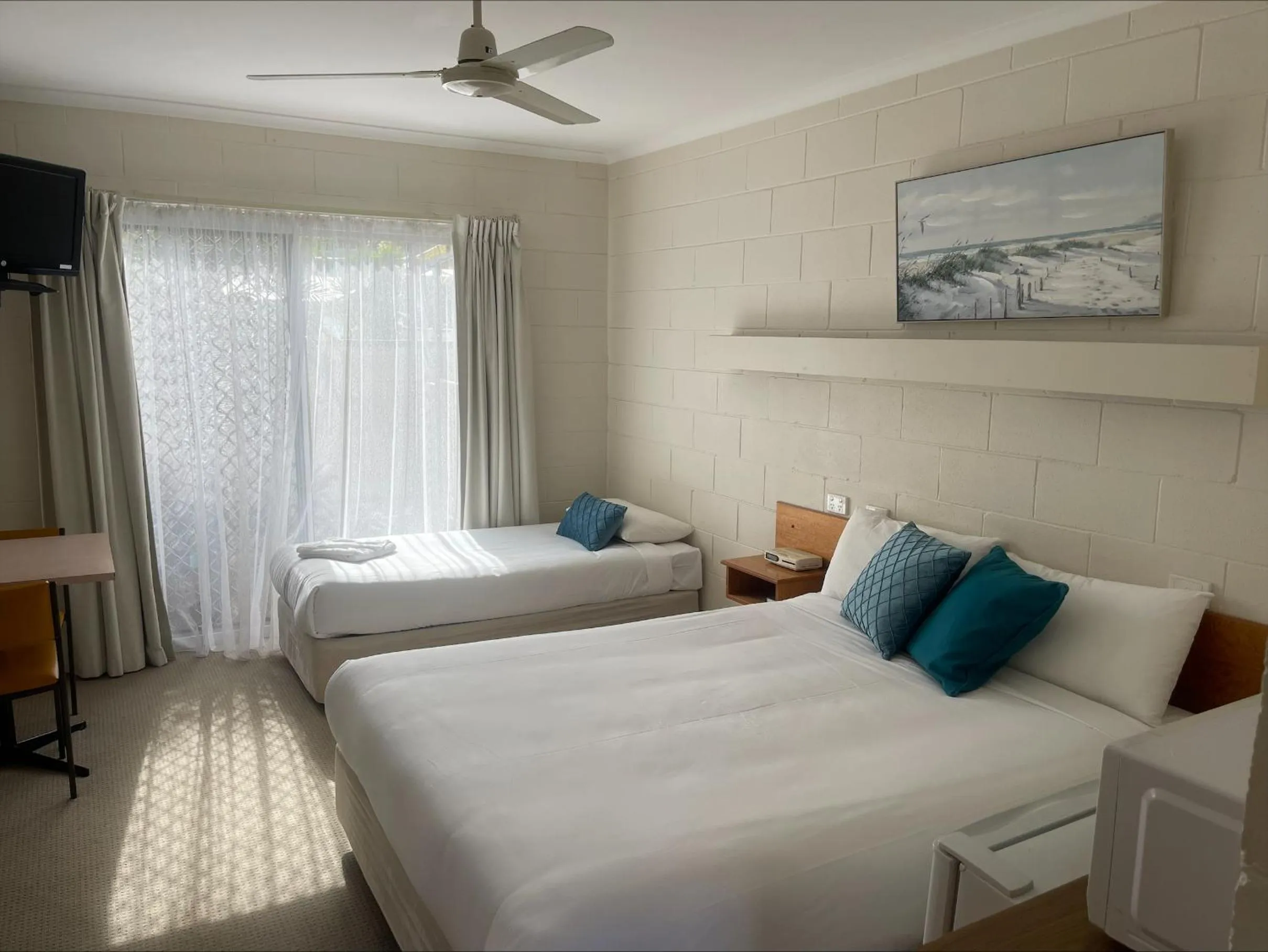 Bed in Corlette Palms Motor Inn