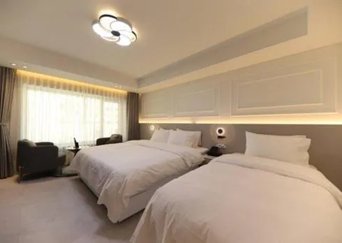 Bed in Gunsan Stay Tourist Hotel