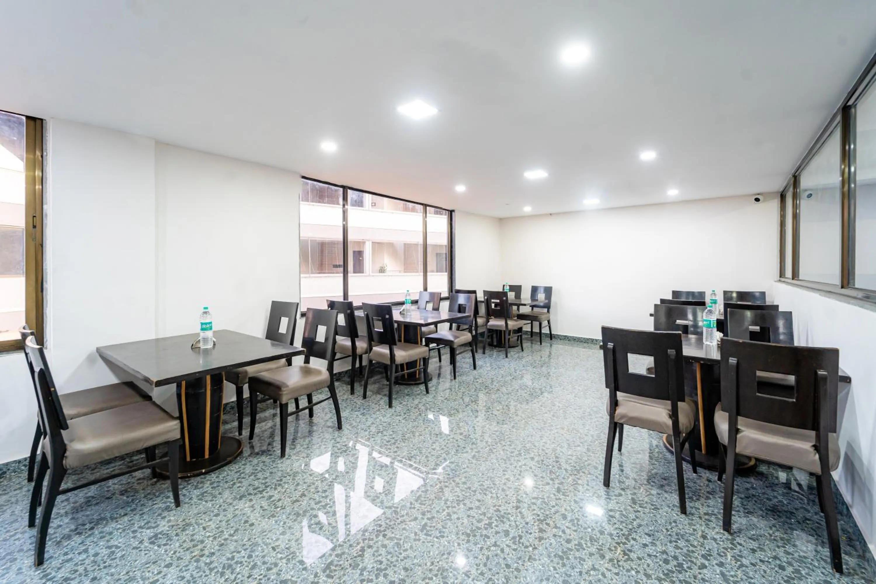 Dining area in Treebo Seven Days, Mahabaleshwar