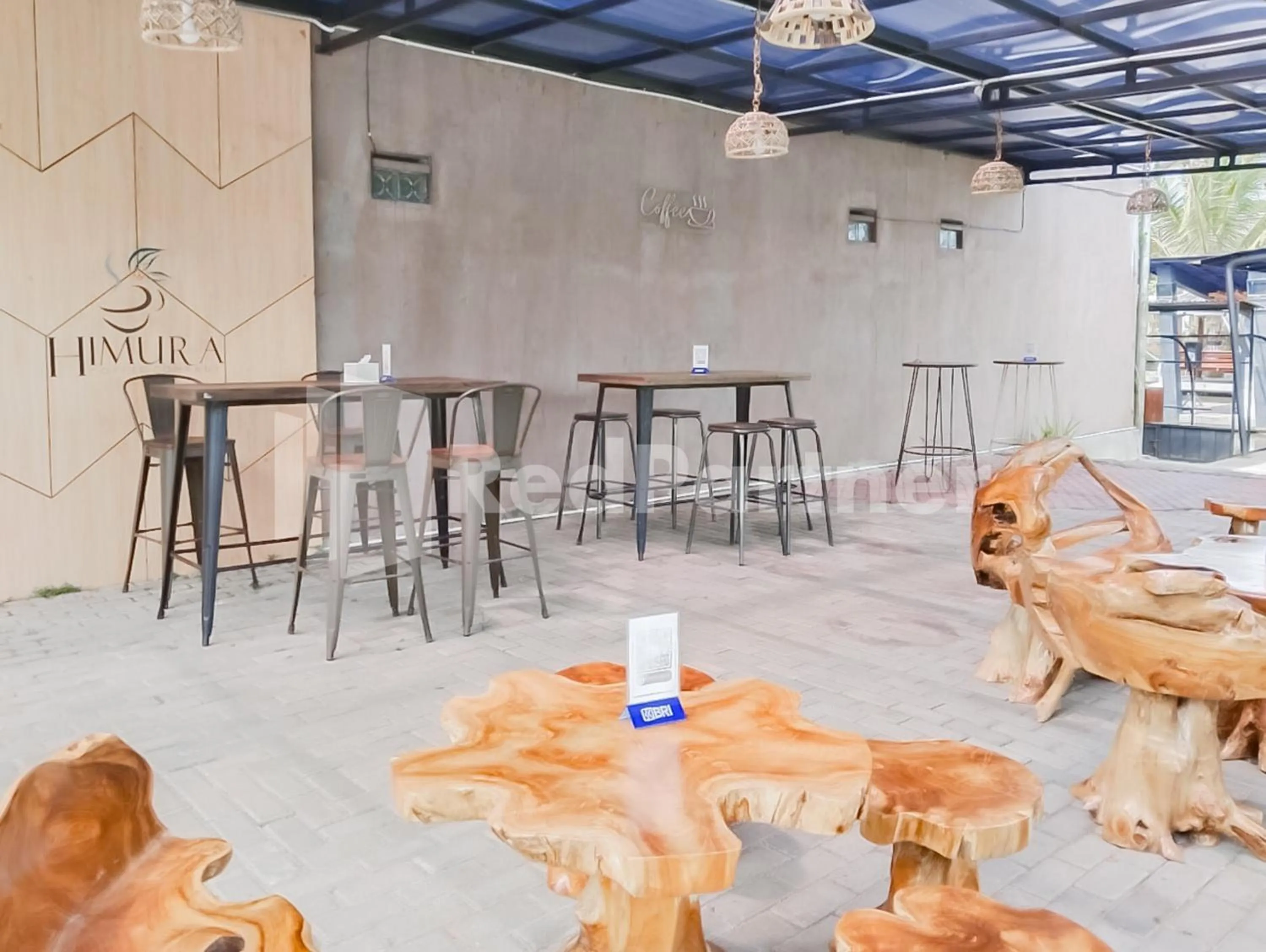 Seating area in Khayrizsan Guest House Mitra RedDoorz