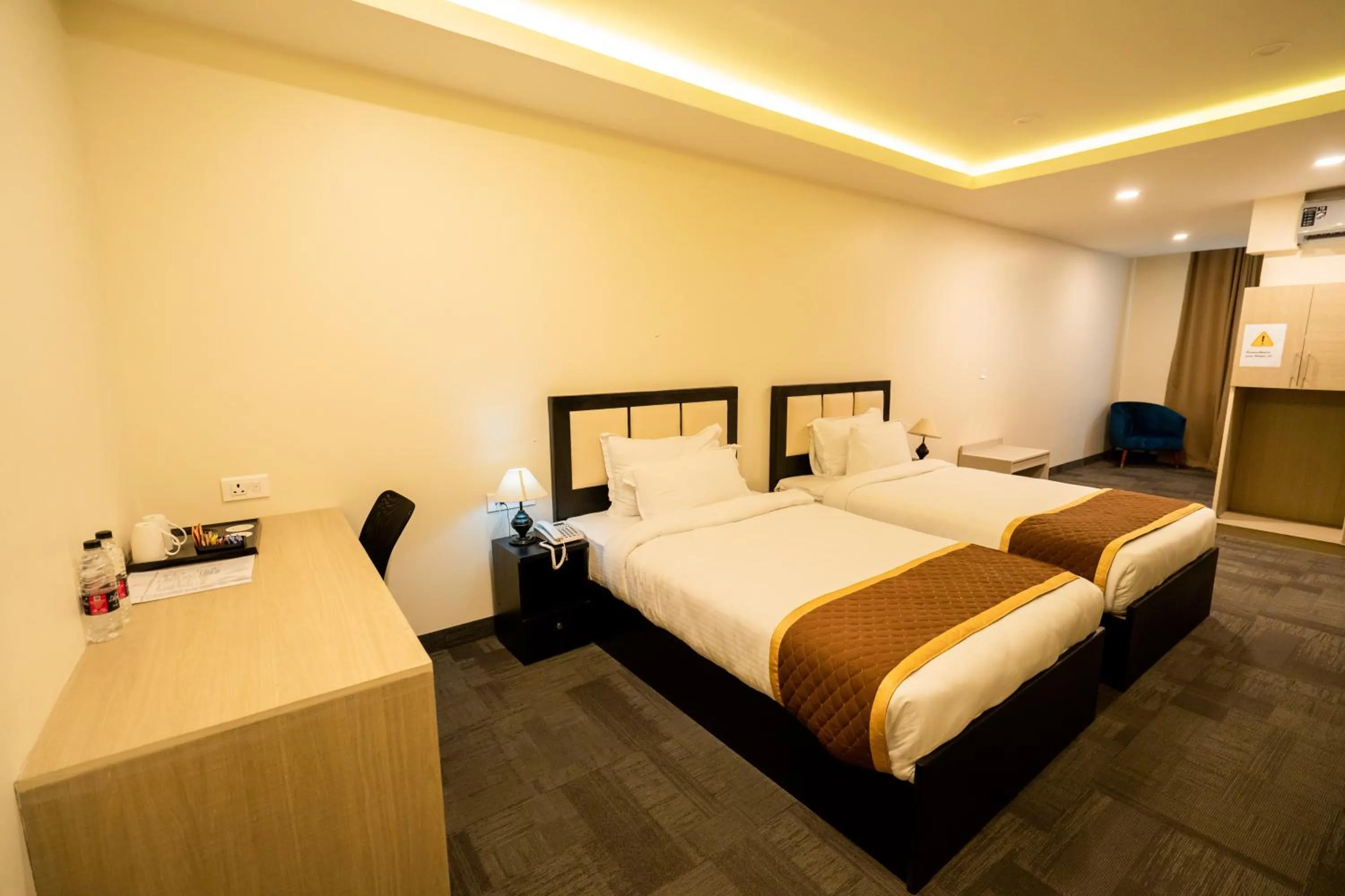 Bed in ROYALE LALAWI HOTEL