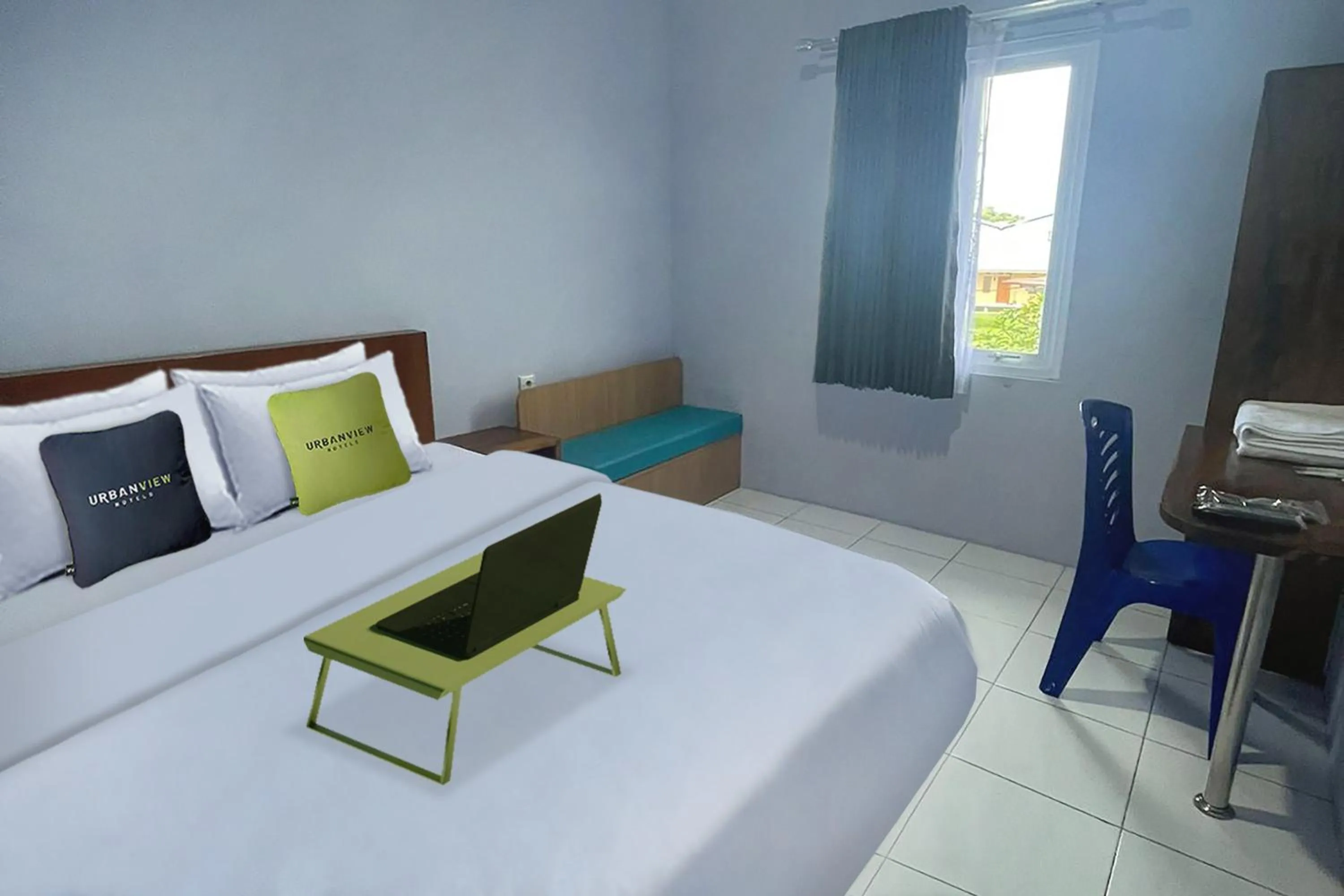 Bed in Urbanview Hotel Mutiara Persada Syariah Majalengka by RedDoorz