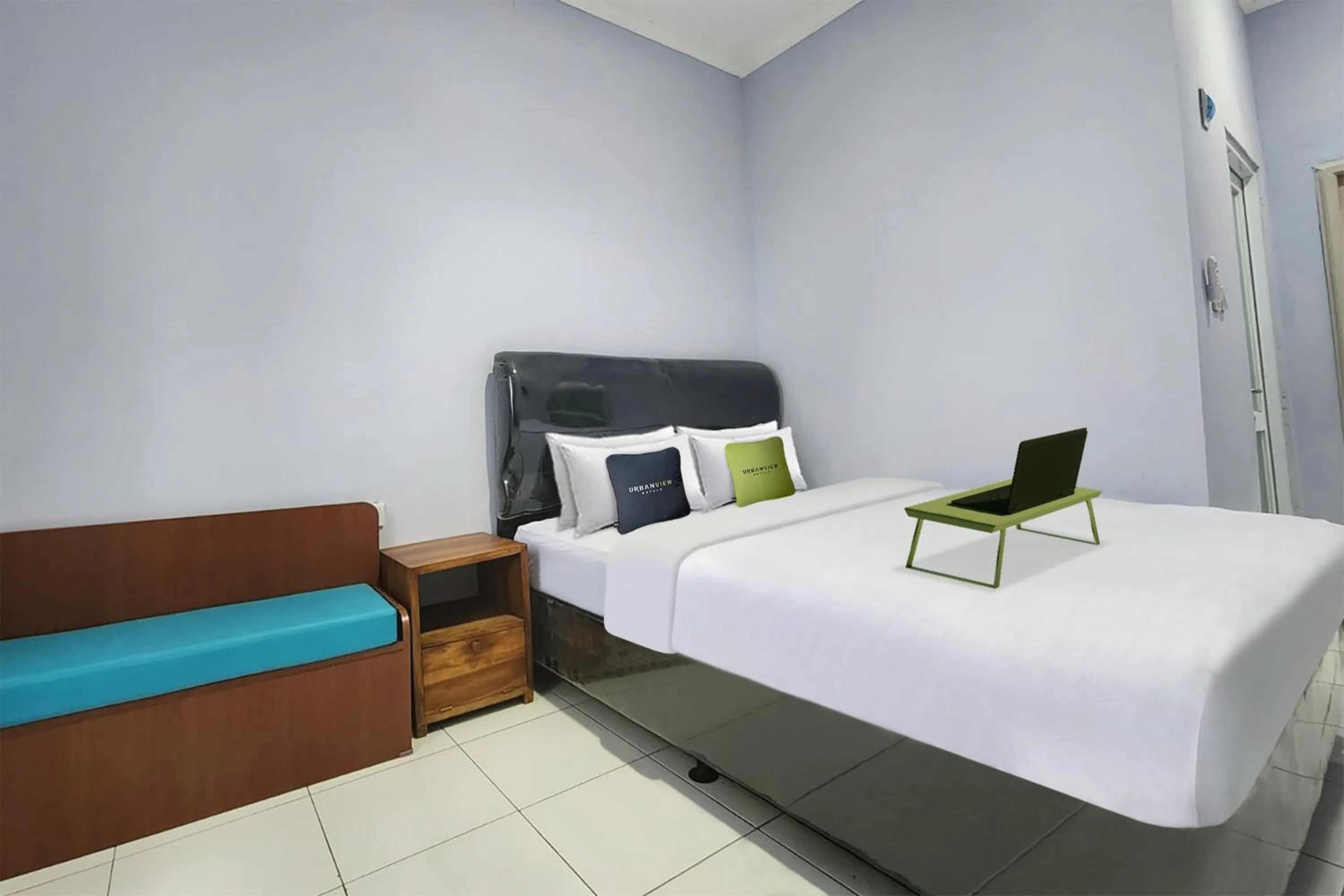 Bed in Urbanview Hotel Mutiara Persada Syariah Majalengka by RedDoorz