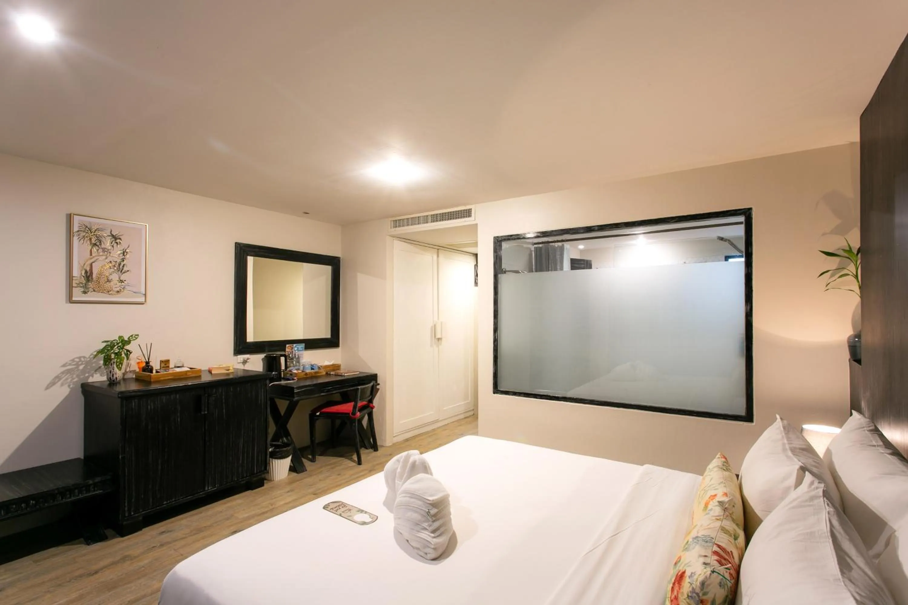 Bed in JALMIN Hotel Samui