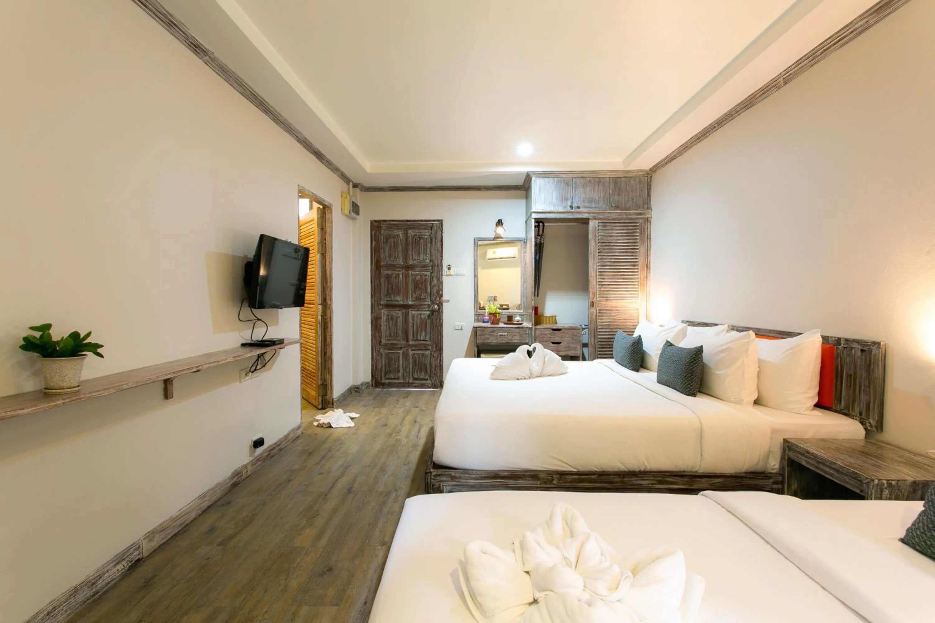 Bed in JALMIN Hotel Samui