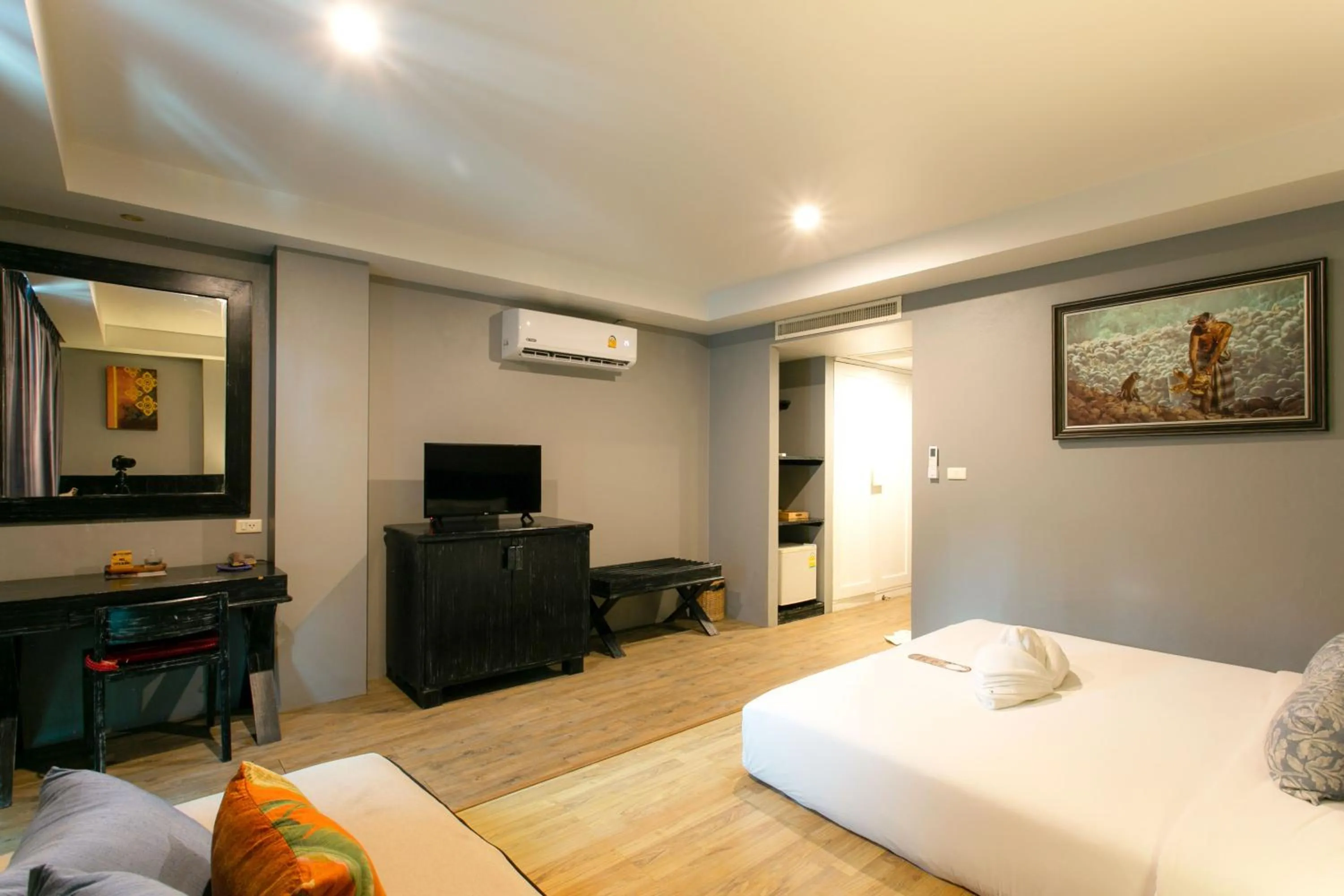 Bed in JALMIN Hotel Samui