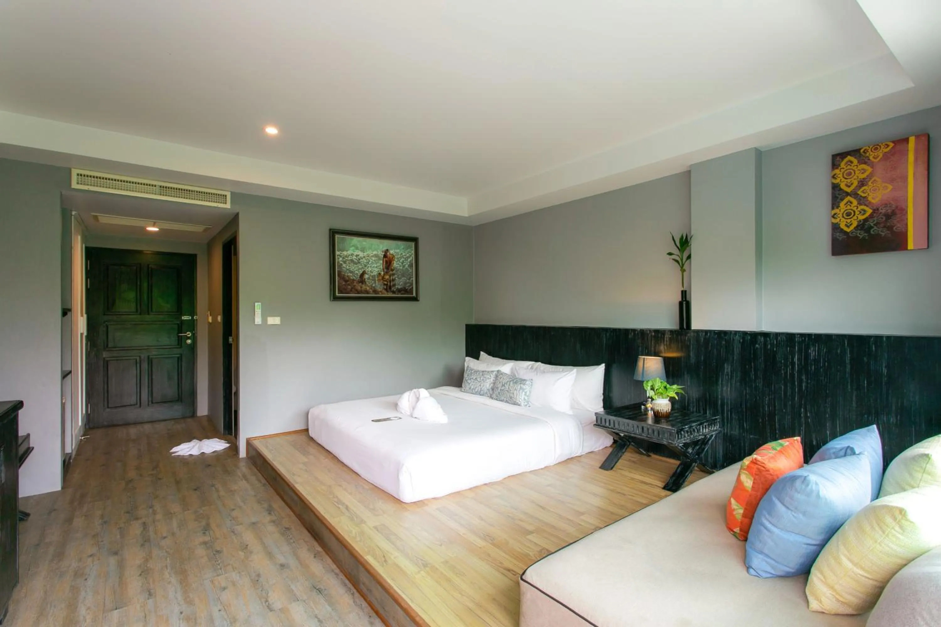 Bed in JALMIN Hotel Samui