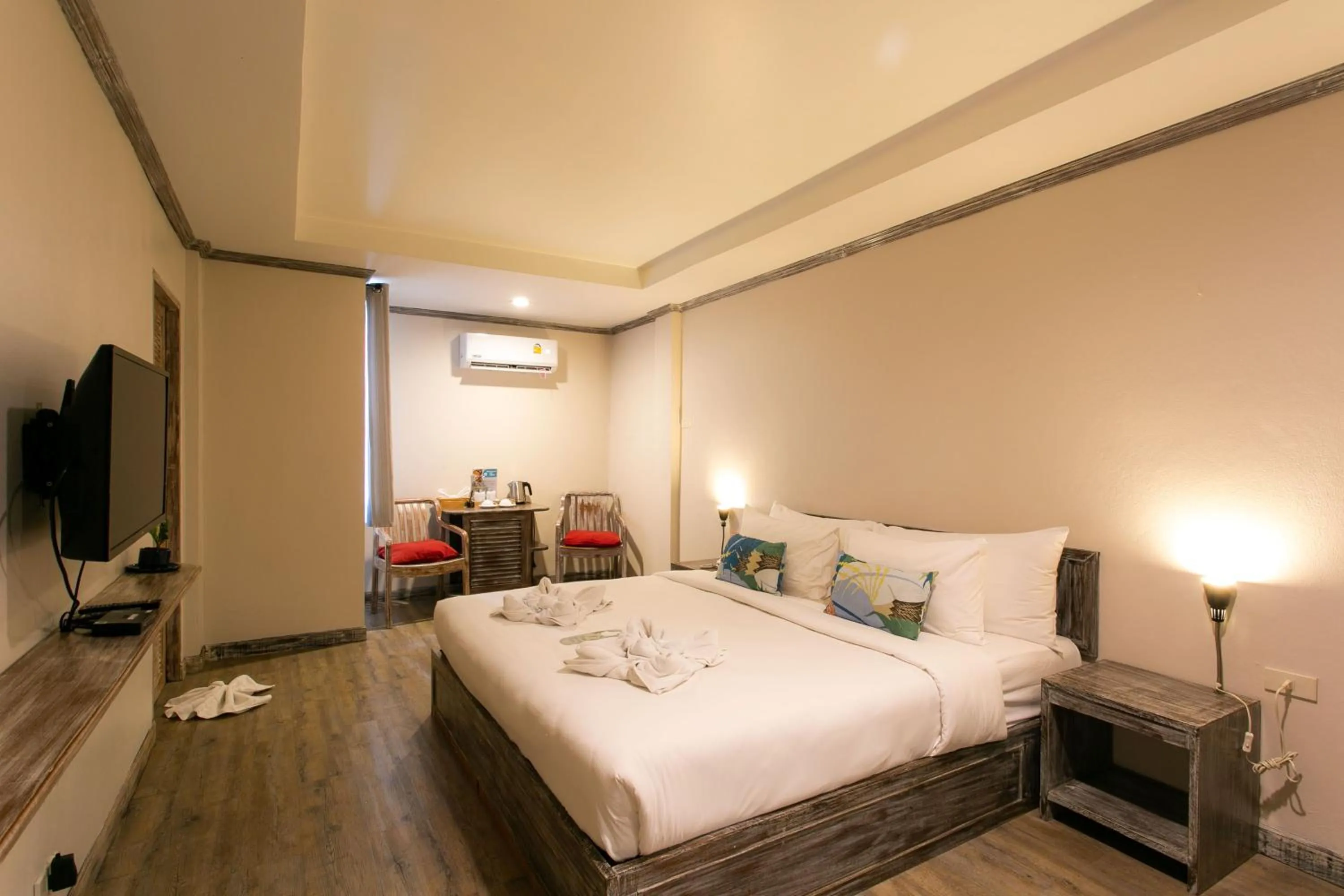 Bed in JALMIN Hotel Samui