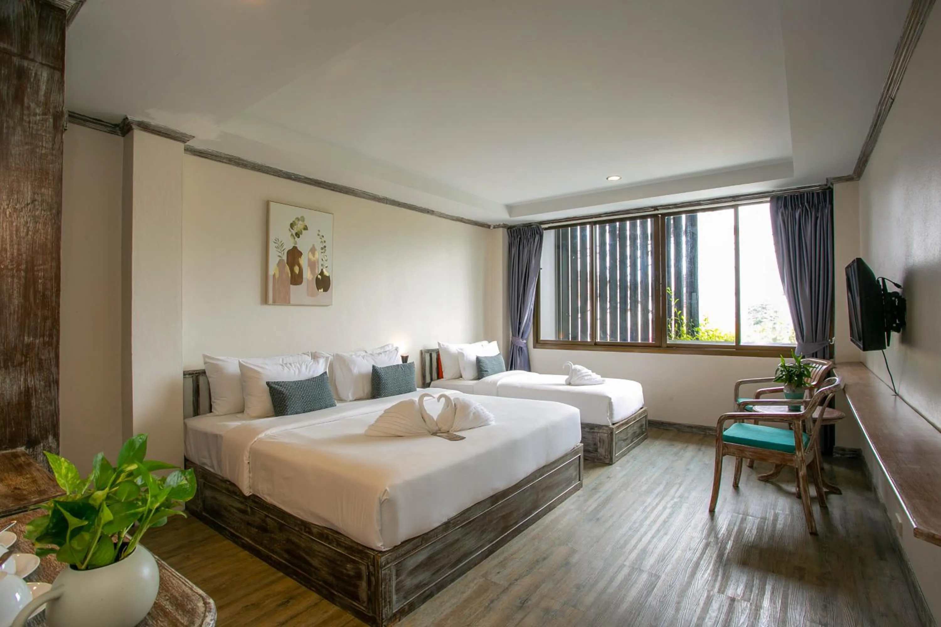 Bed in JALMIN Hotel Samui