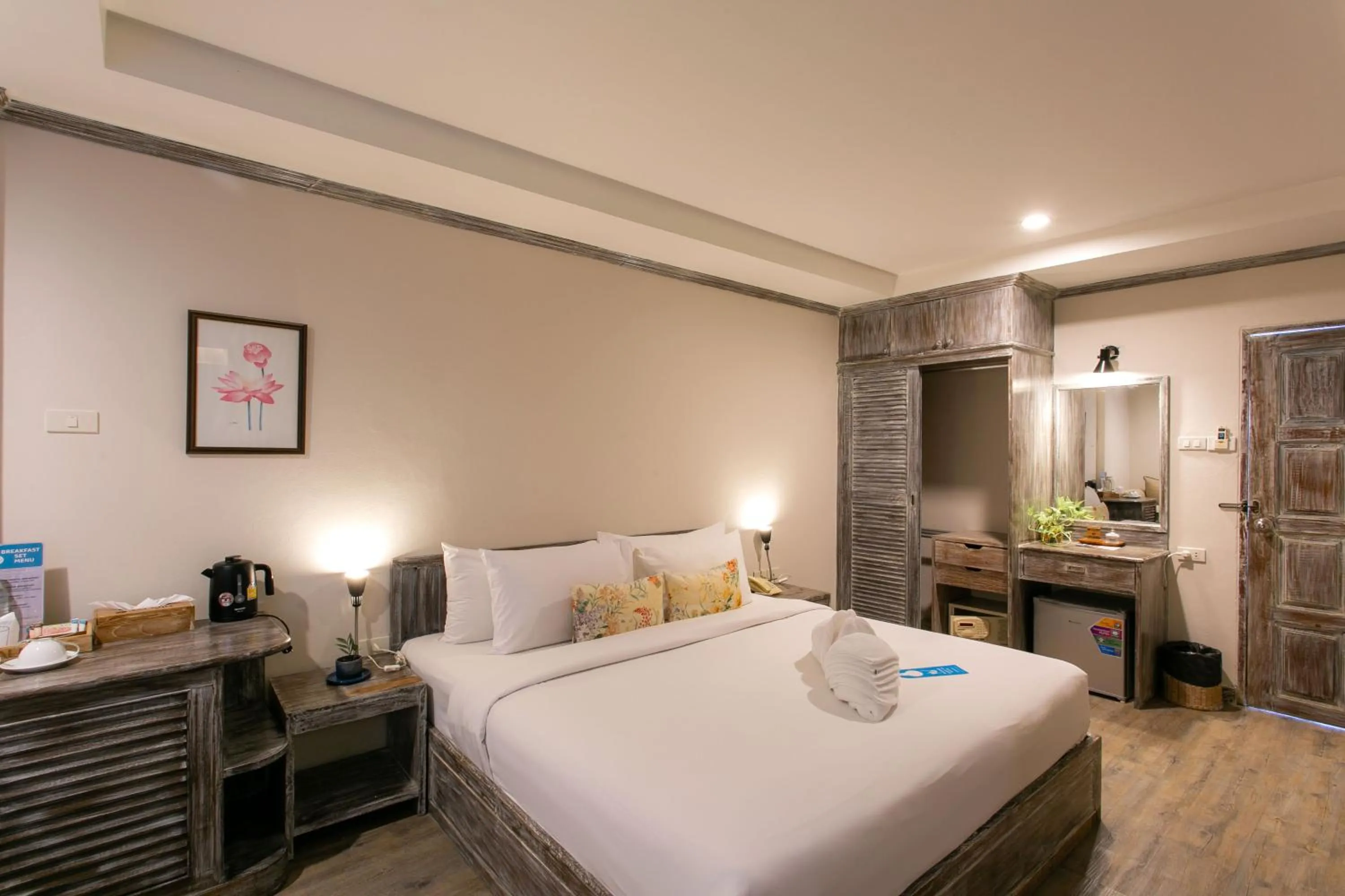 Bed in JALMIN Hotel Samui