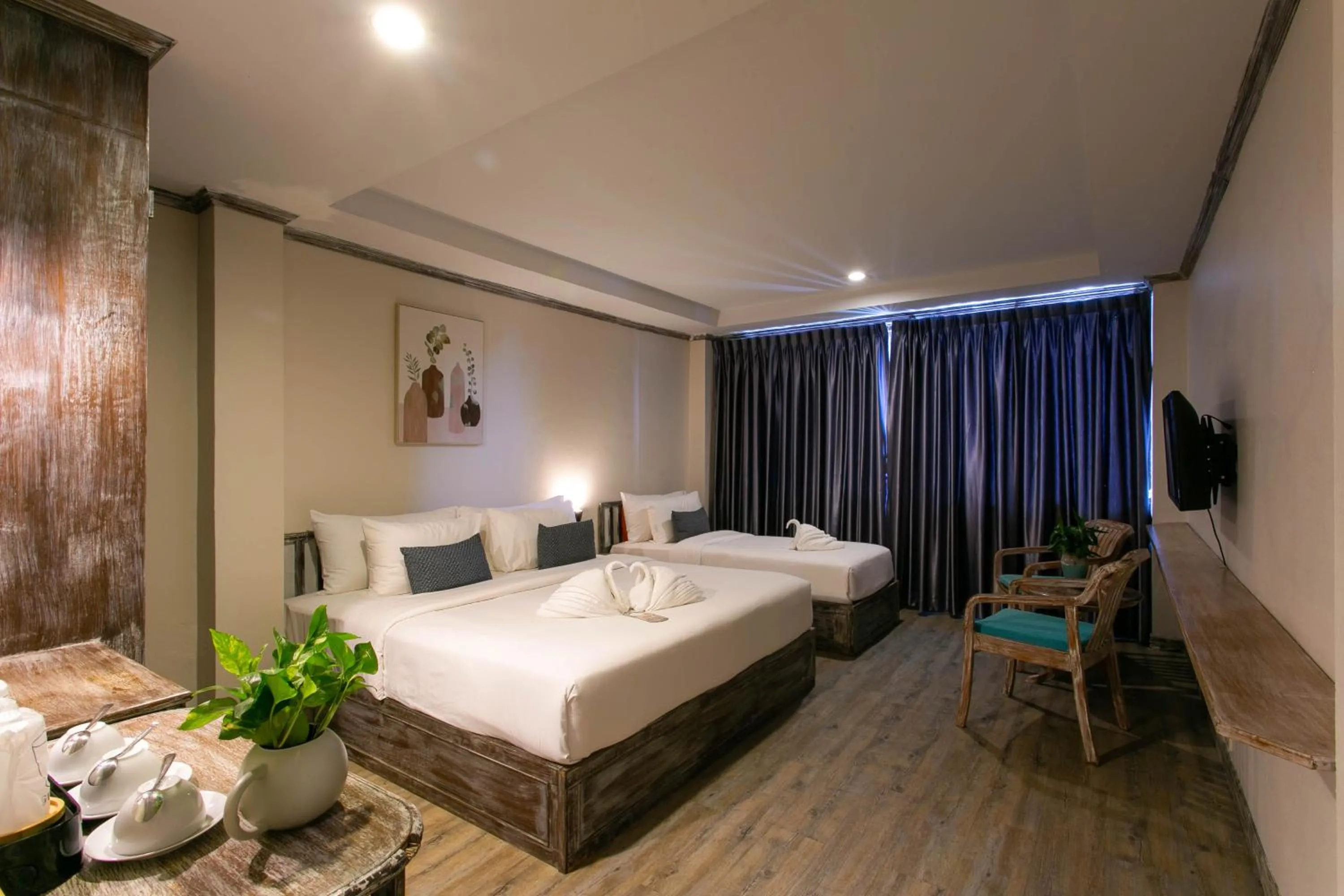 Bed in JALMIN Hotel Samui