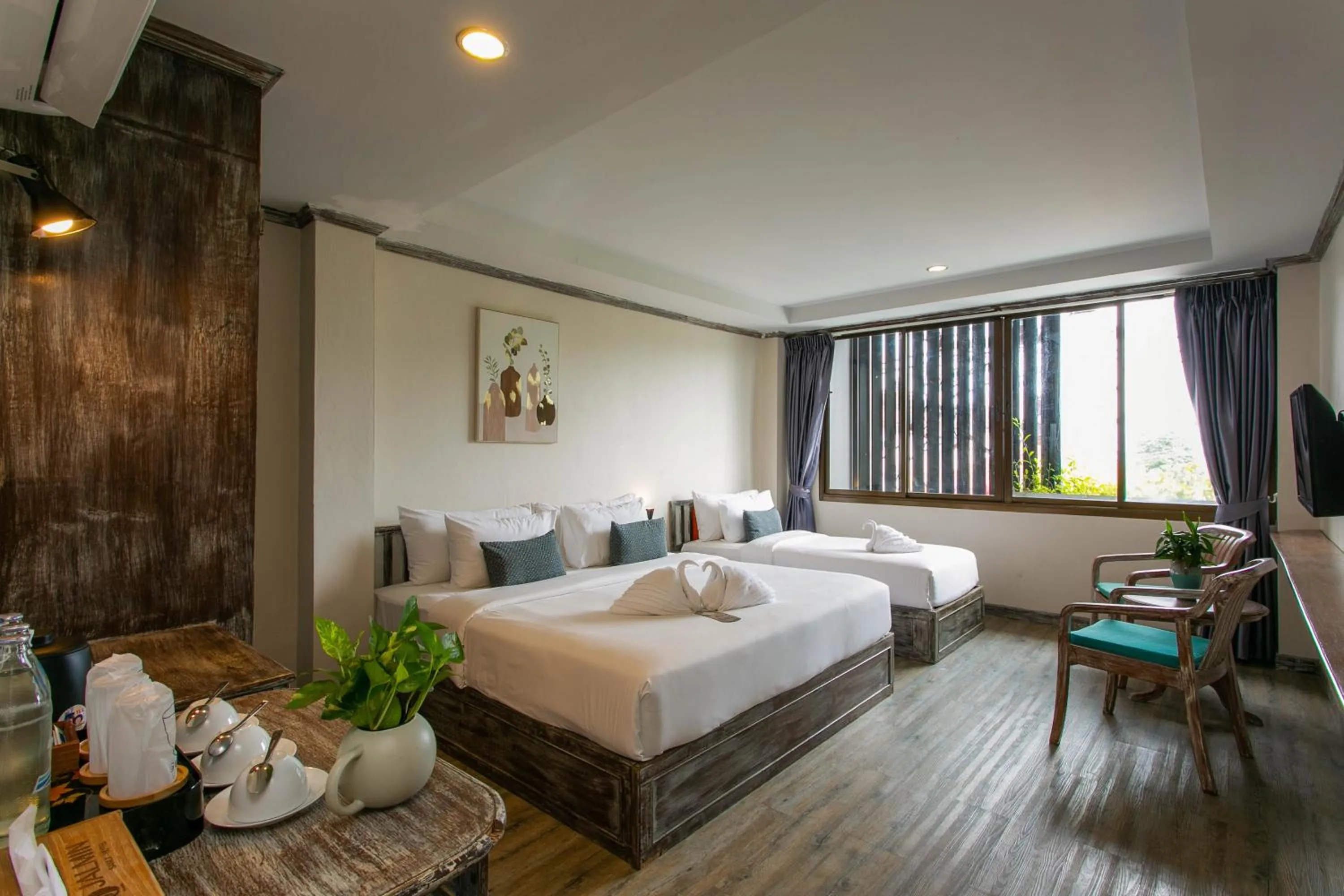 Bed in JALMIN Hotel Samui