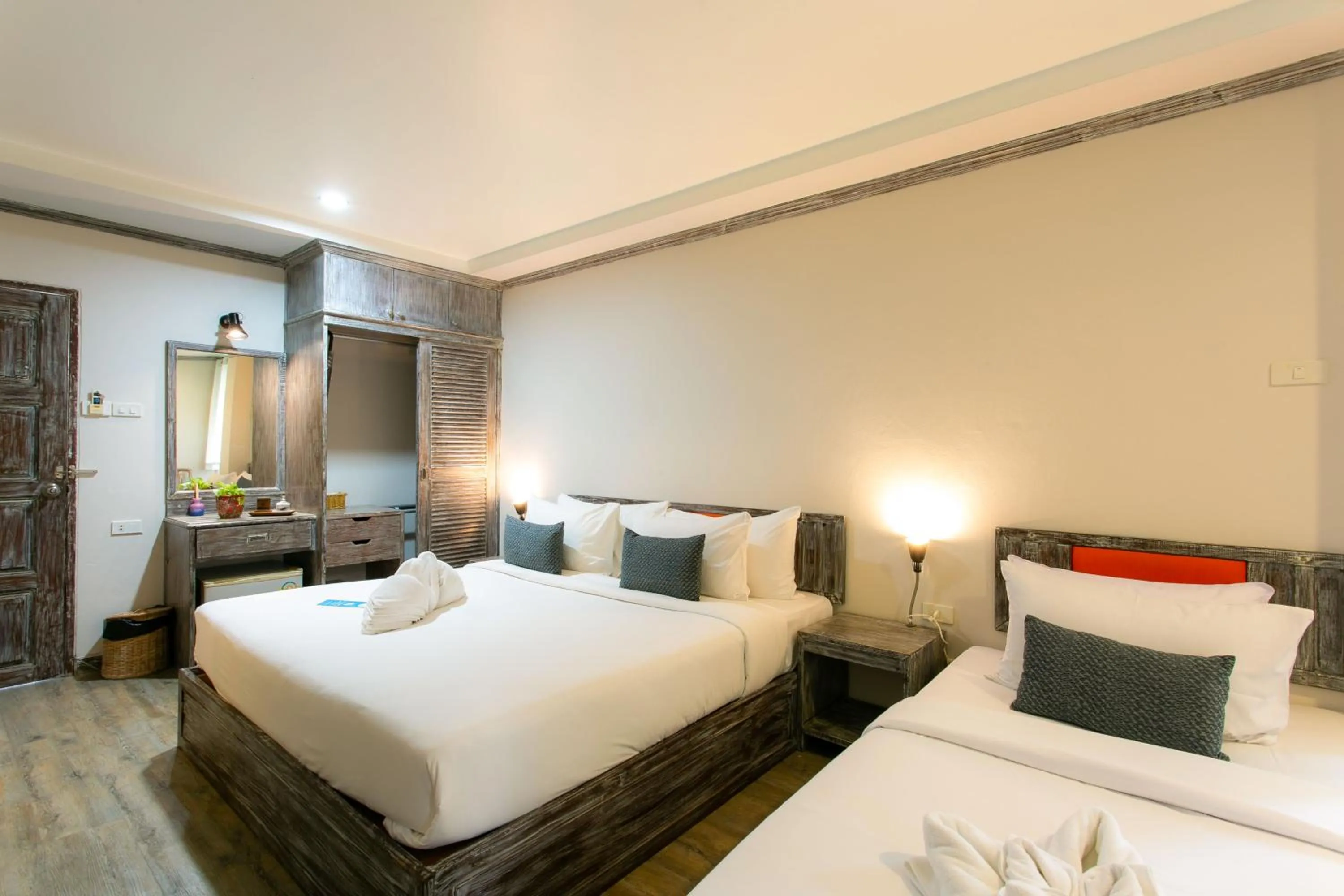 Bed in JALMIN Hotel Samui