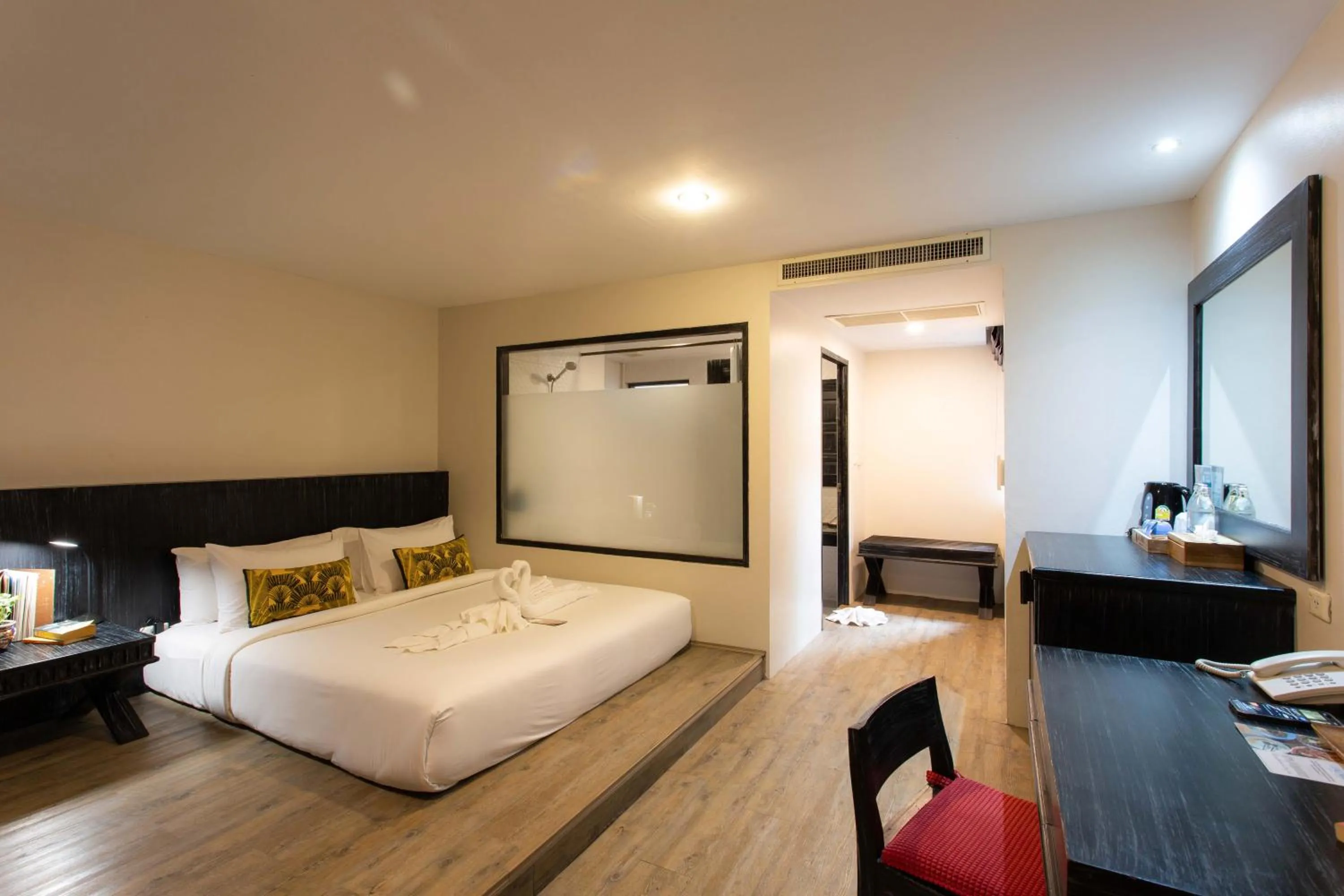 Bed in JALMIN Hotel Samui