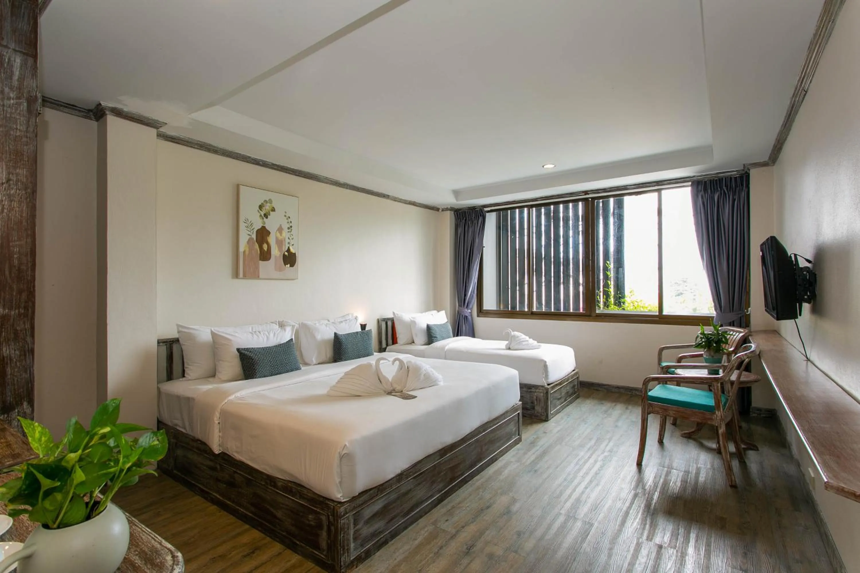 Bed in JALMIN Hotel Samui