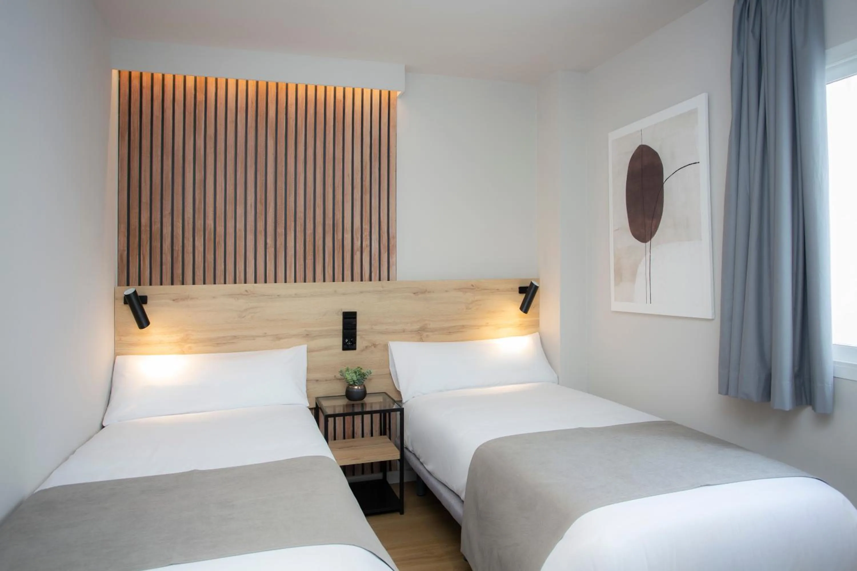 Bed in Aila II Hotel Boutique by SingularStays - Digital Access