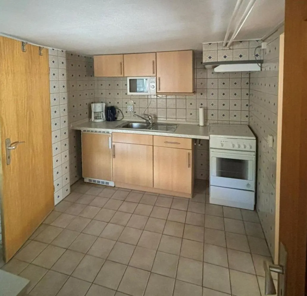 Kitchen or kitchenette in Pension Döser Strand