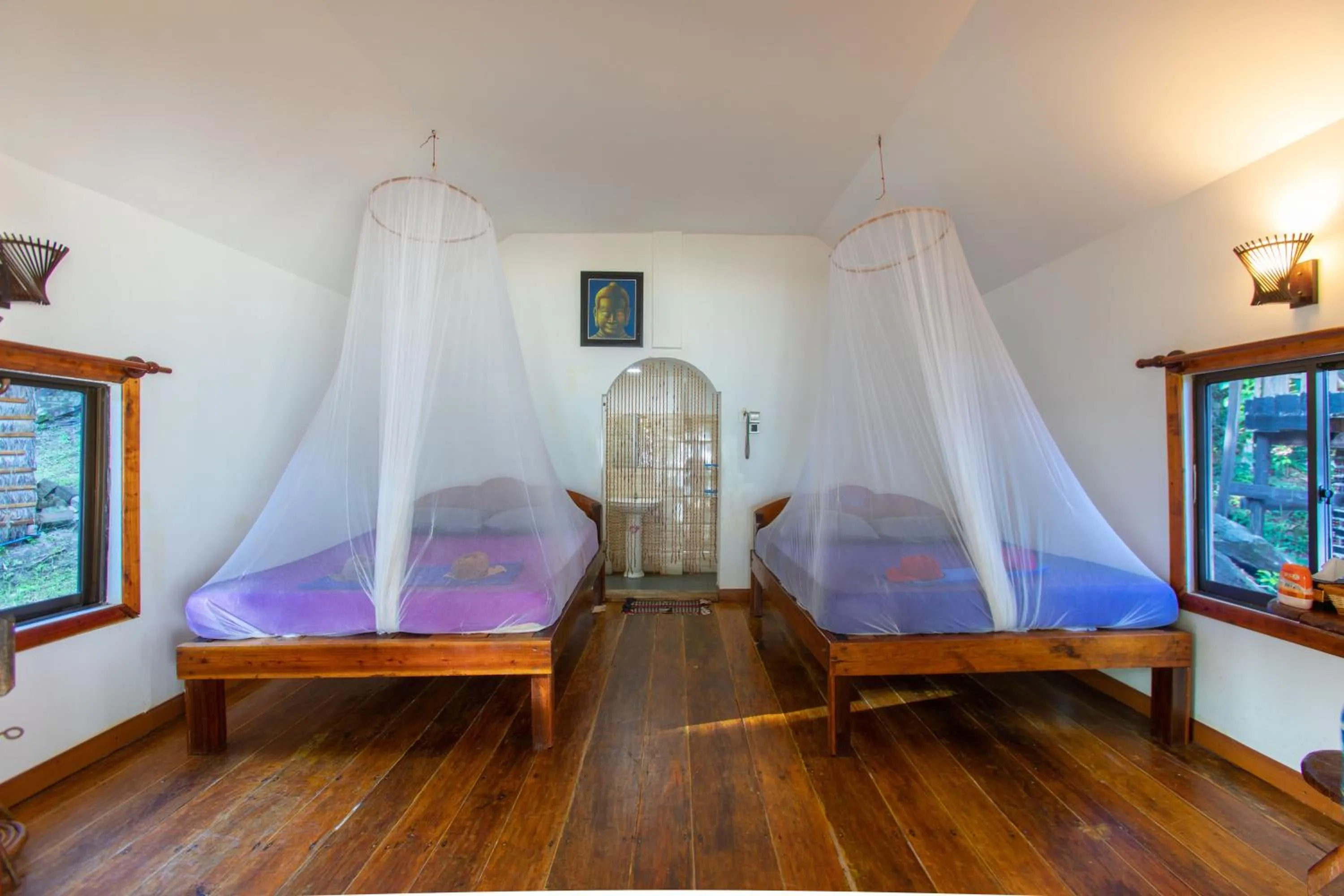 Bedroom in White Beach Bungalows