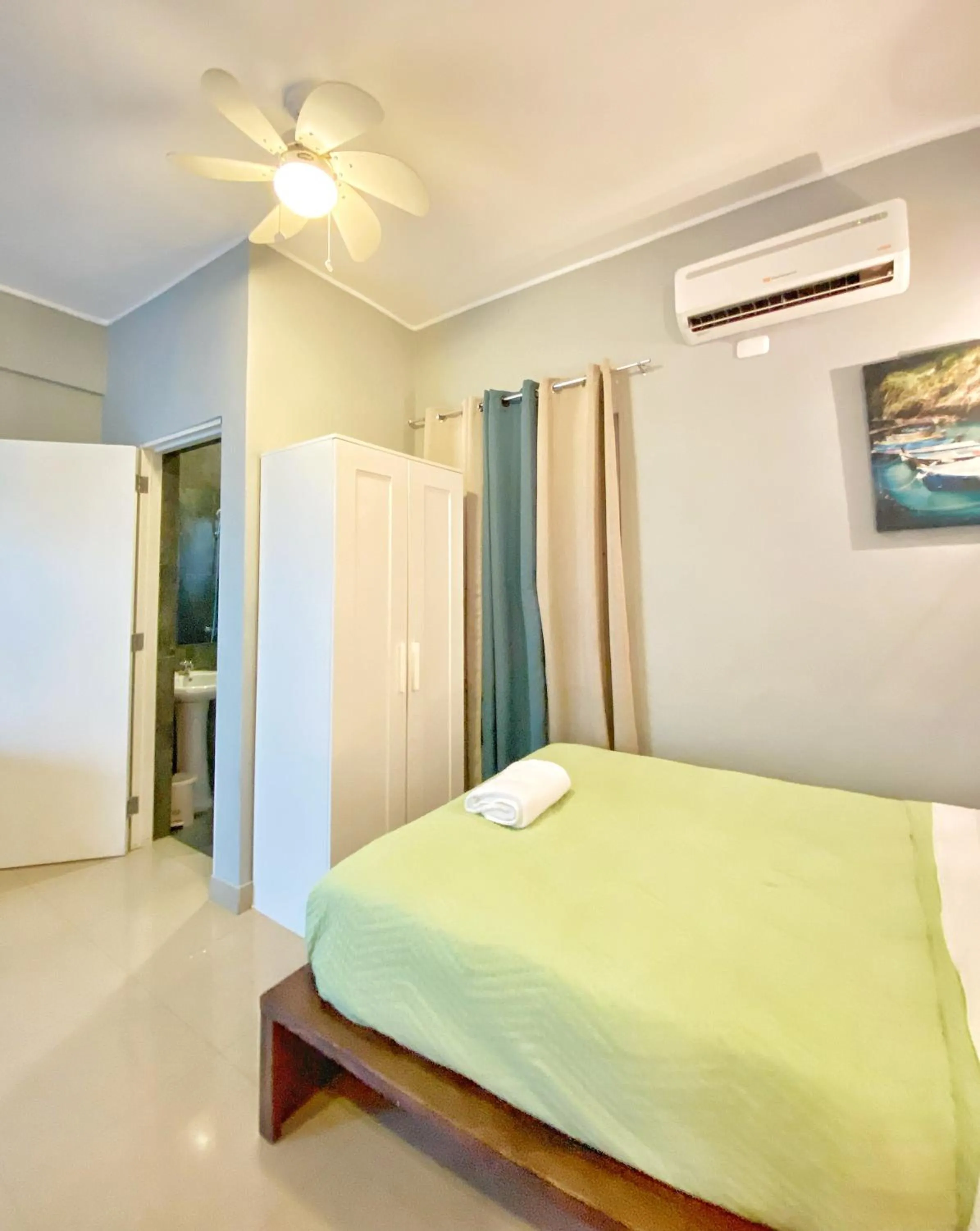 Bed in Green Oasis Hotel