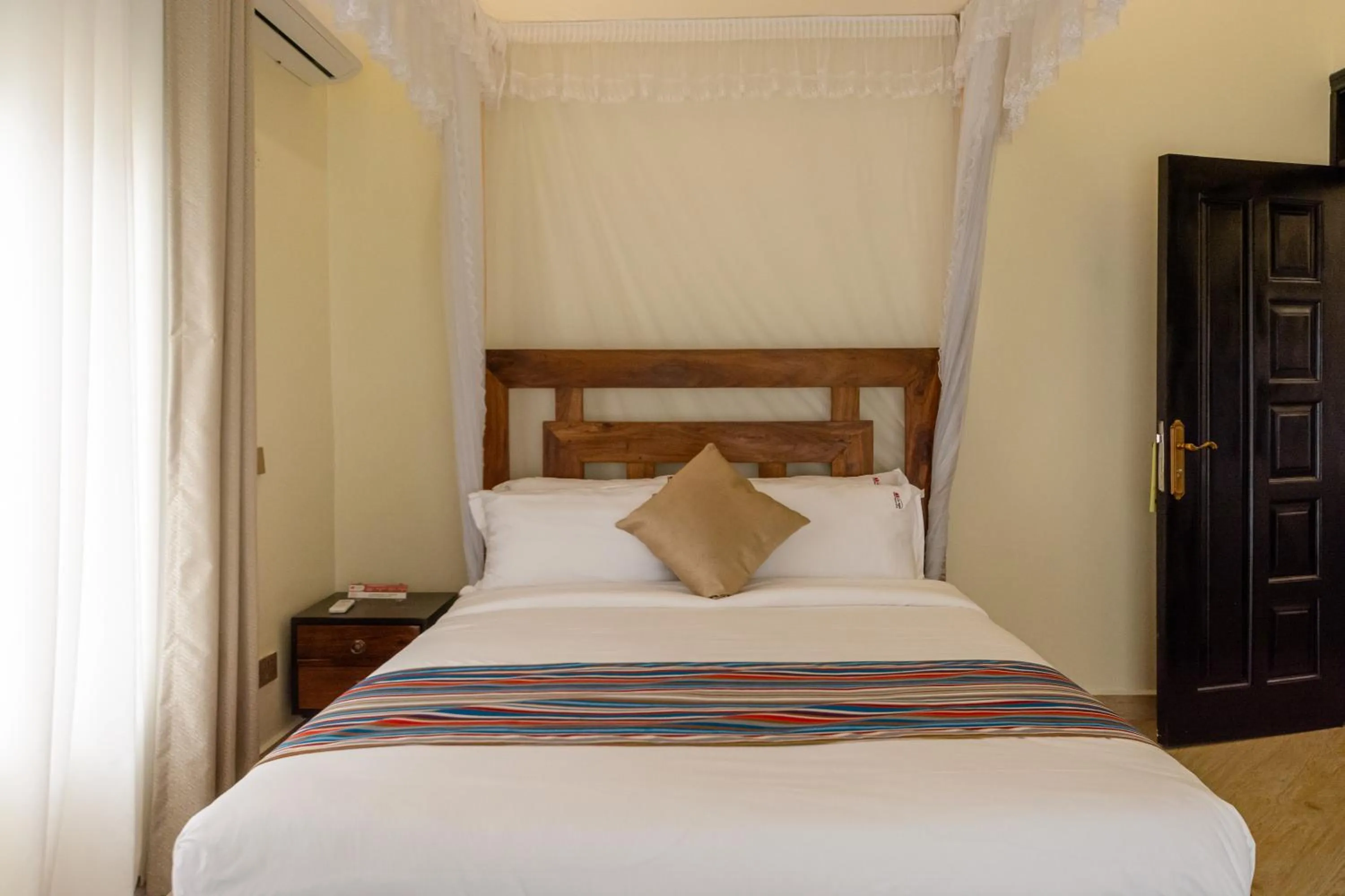 Bed in Las Vegas Garden Hotel Mbarara