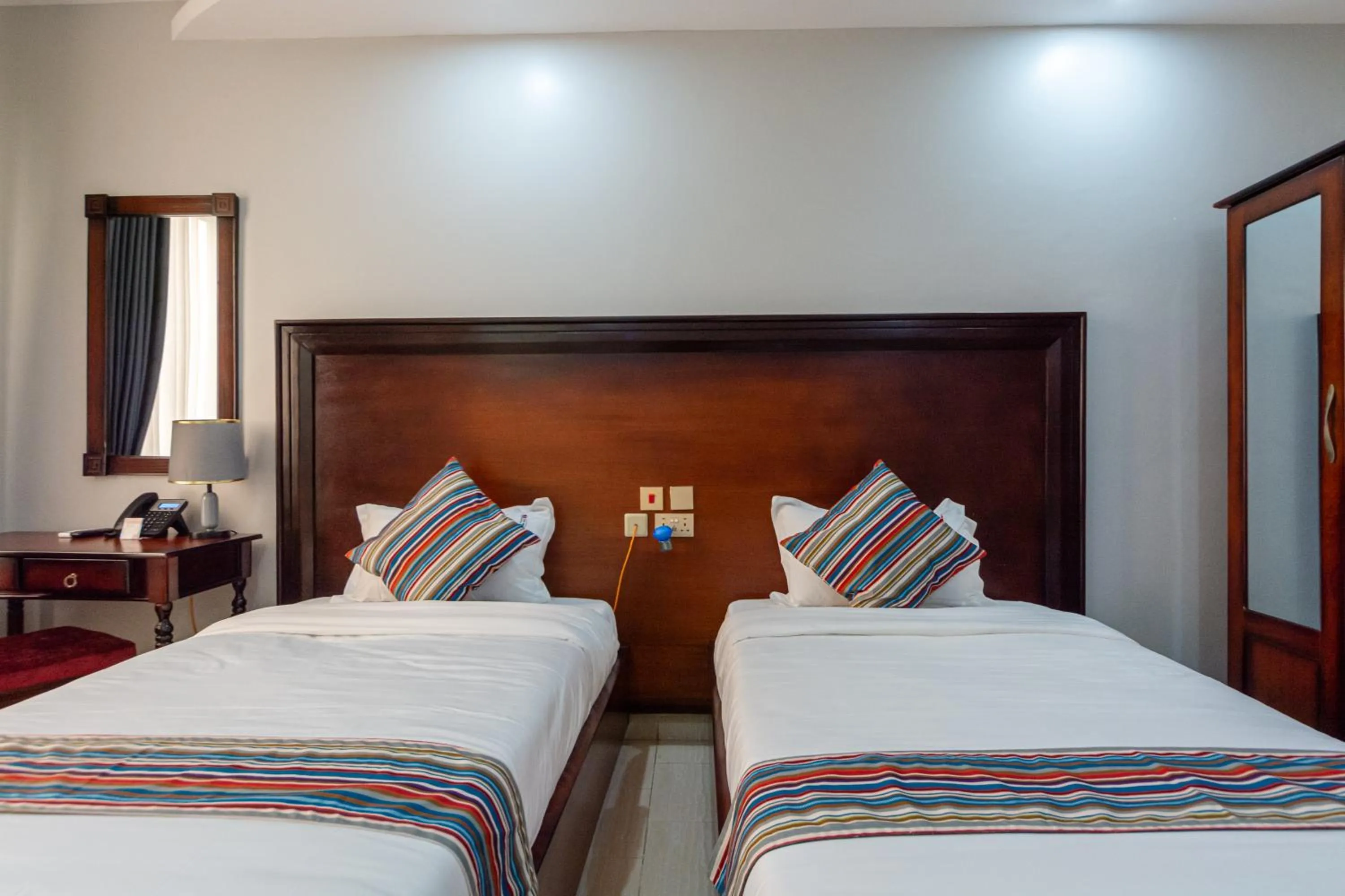 Bed in Las Vegas Garden Hotel Mbarara