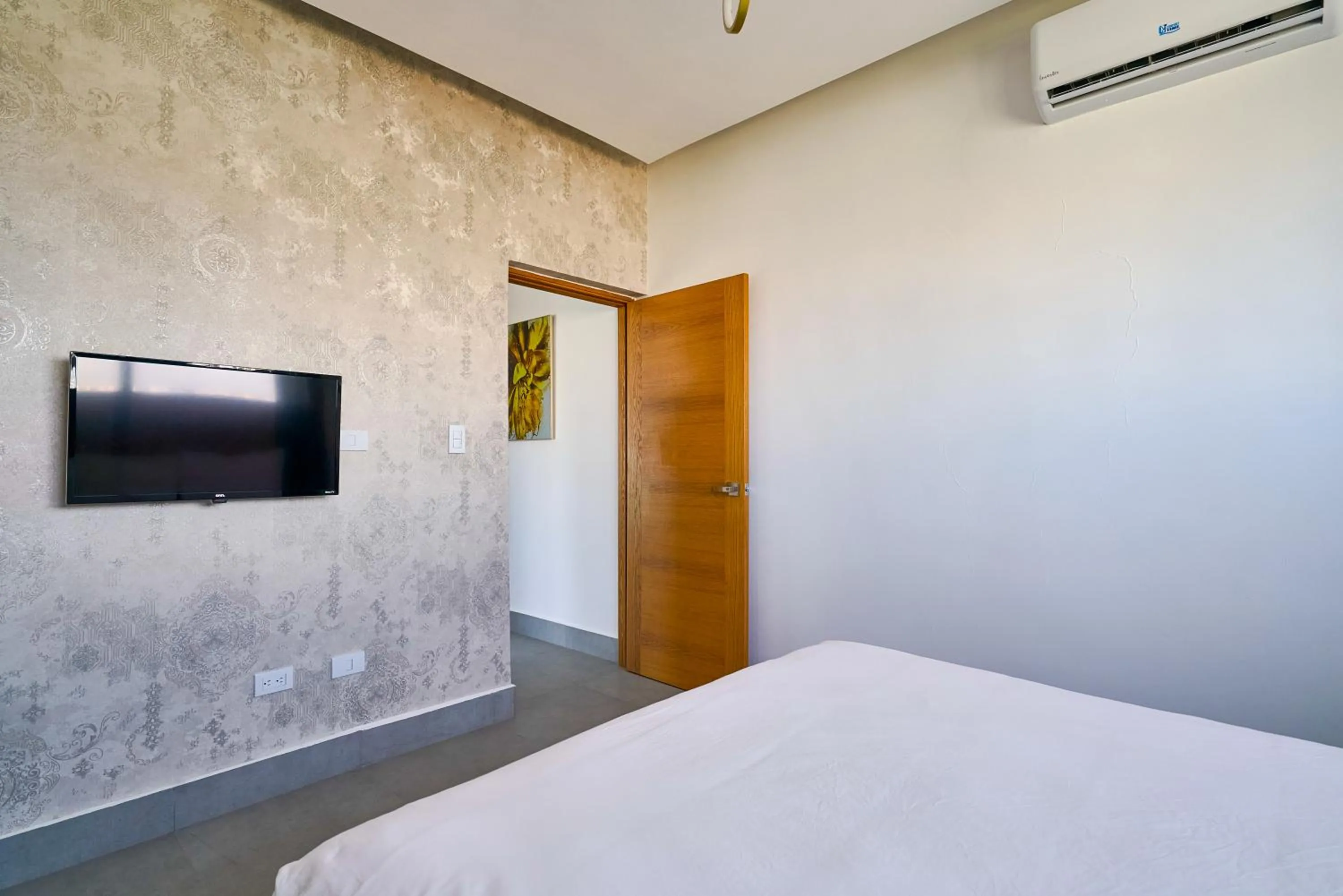 Bed in Central Suites Tower