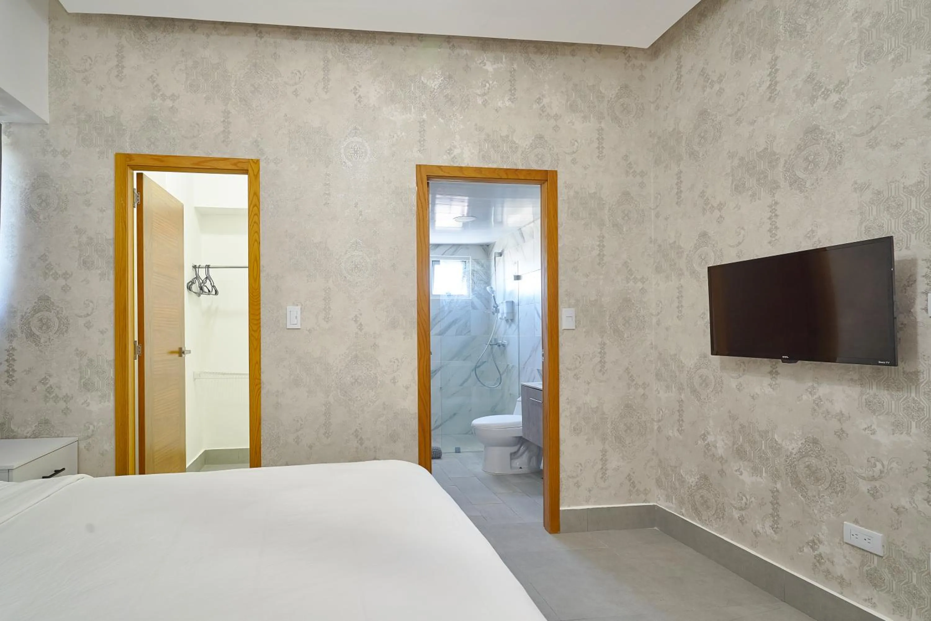 Bed in Central Suites Tower