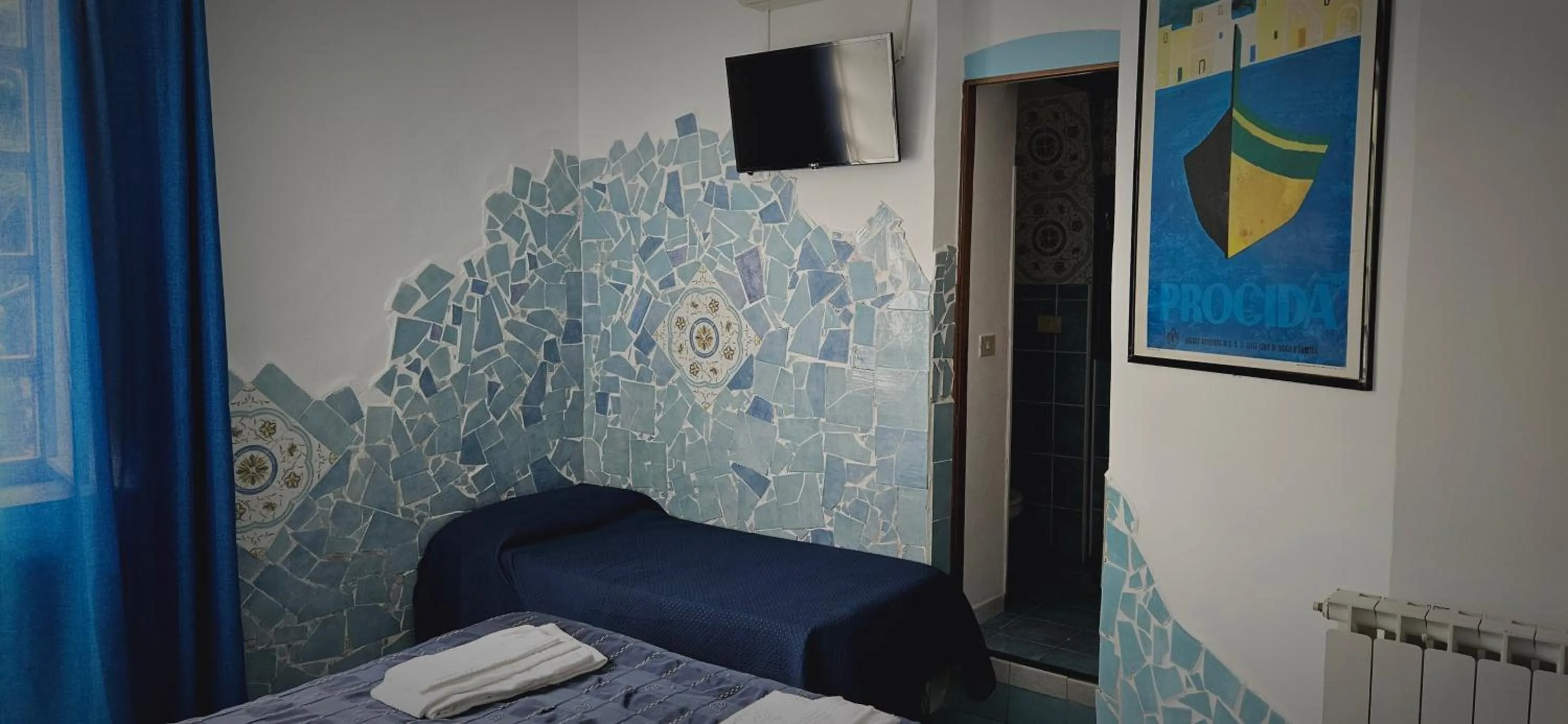 Bed in Piccolo Tirreno Hotel Residence