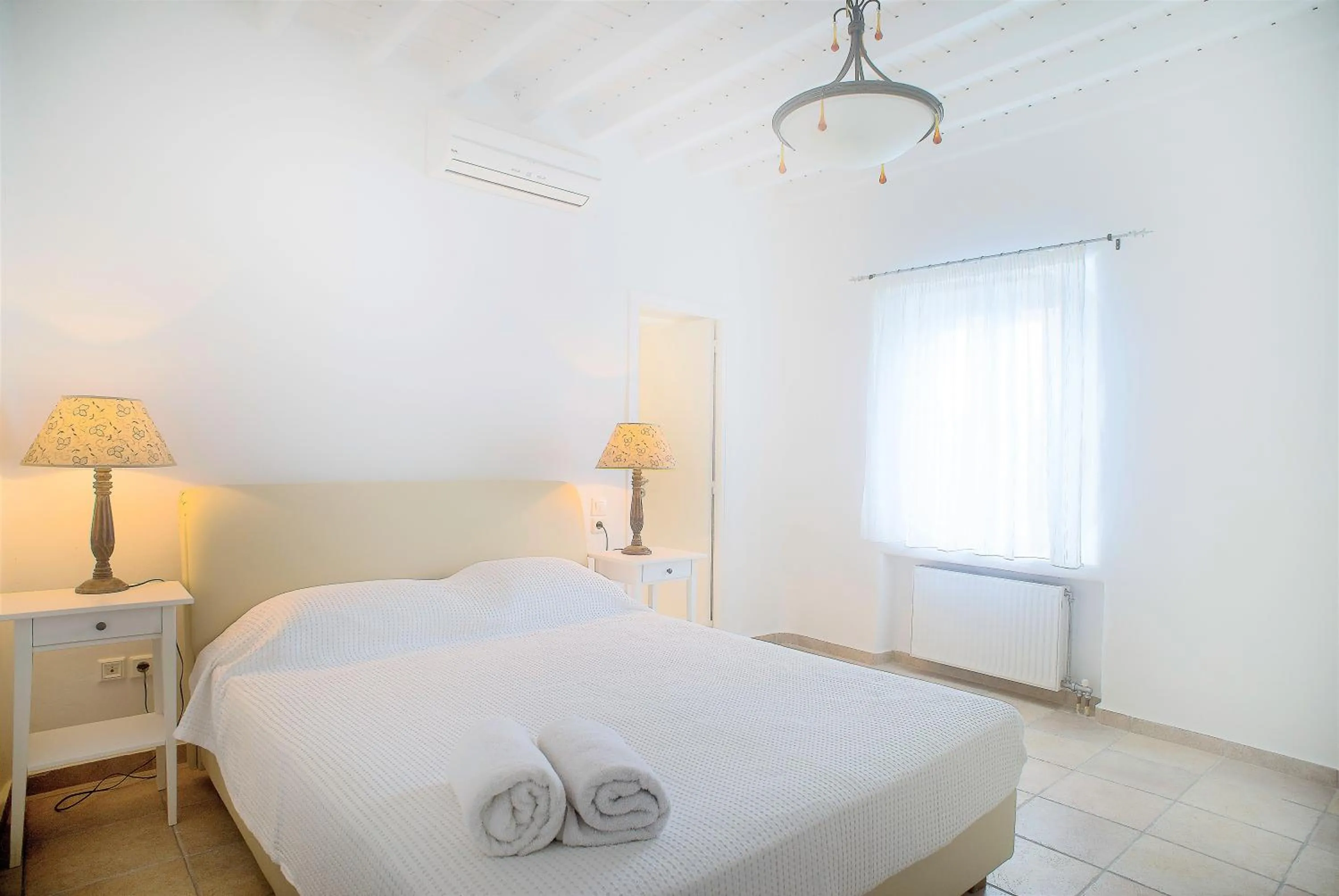 Bed in Aeri Villas & Apartments