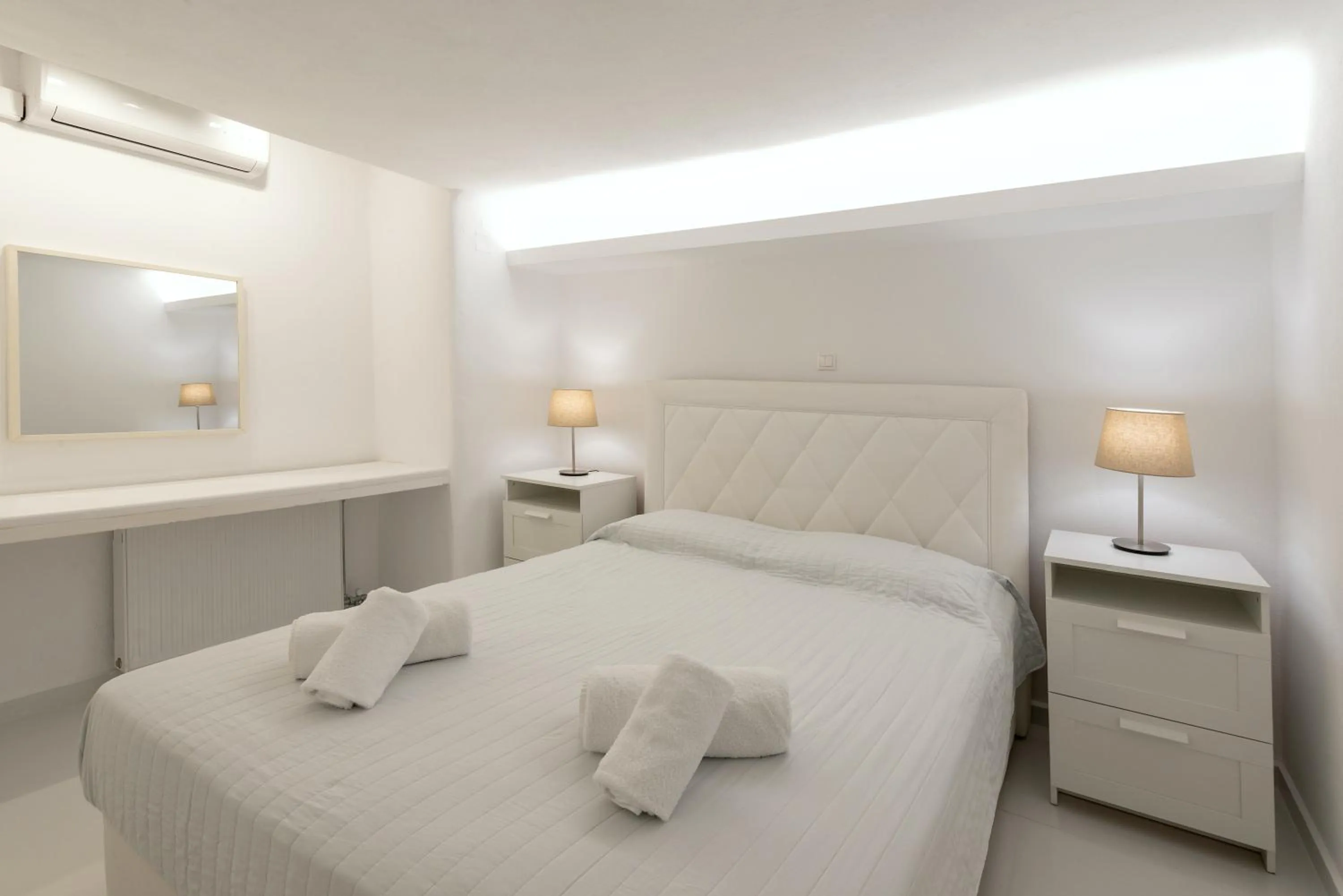 Bed in Aeri Villas & Apartments