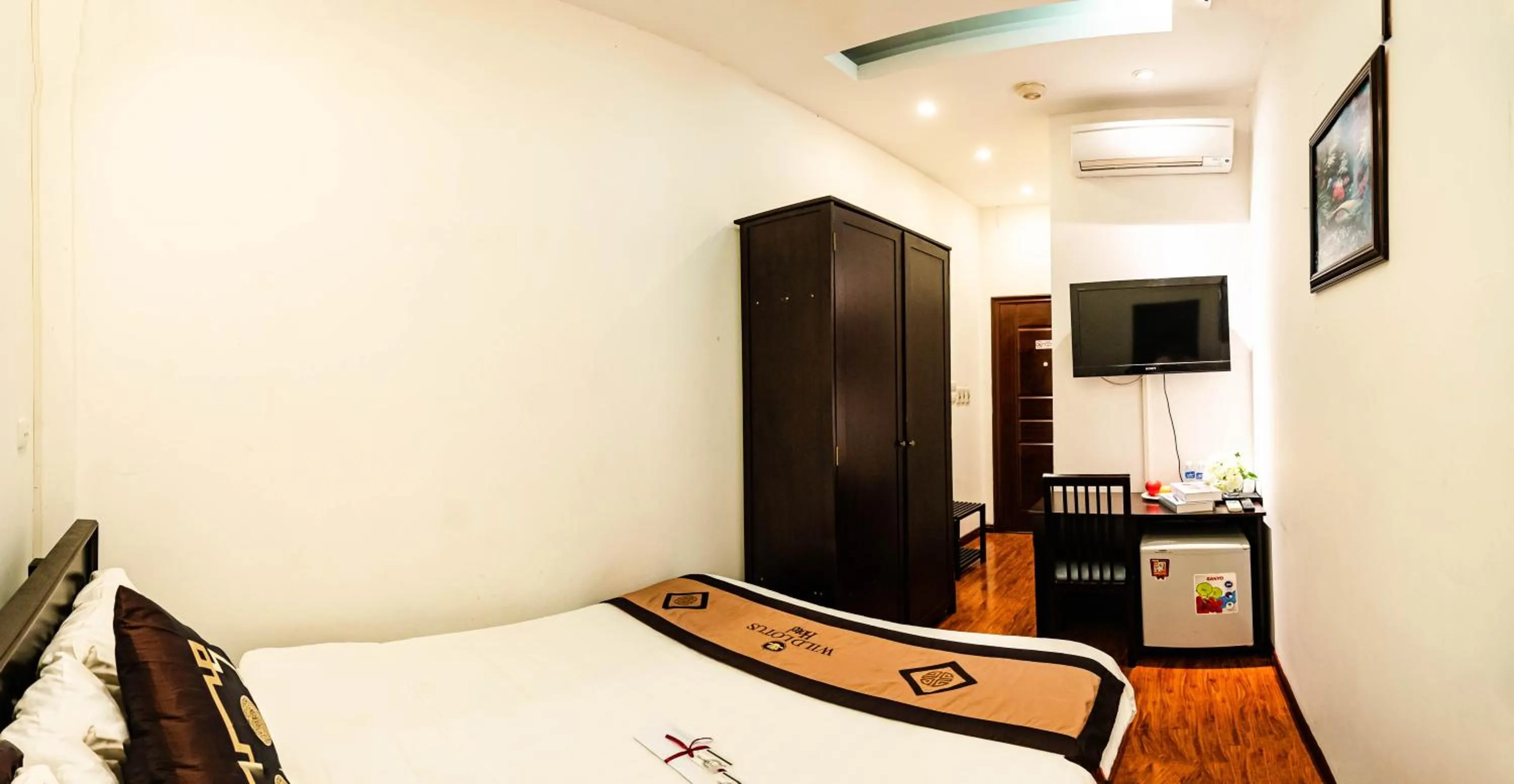 Bed in Wild Lotus Hotel & Travel 2