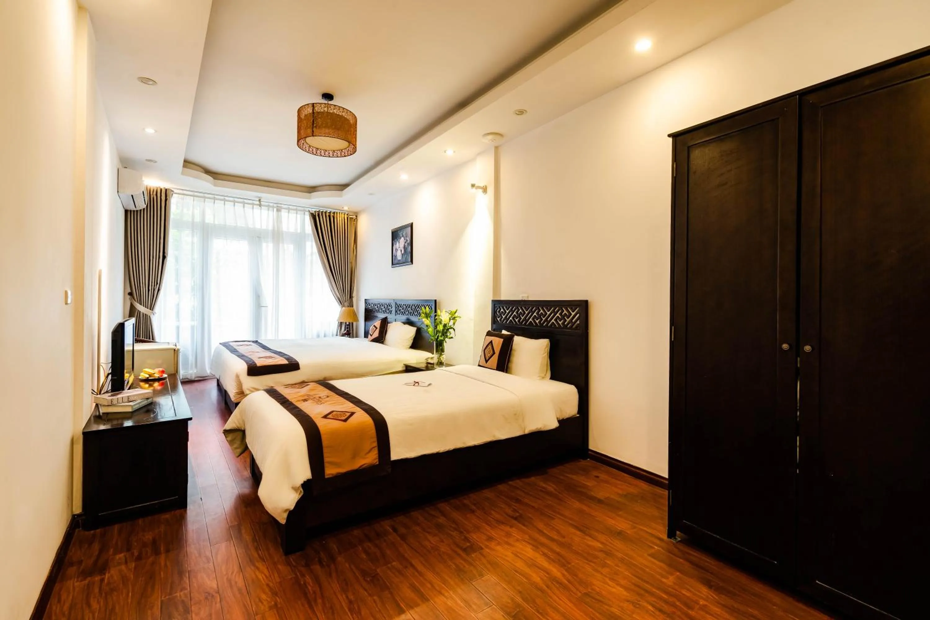 Bed in Wild Lotus Hotel & Travel 2