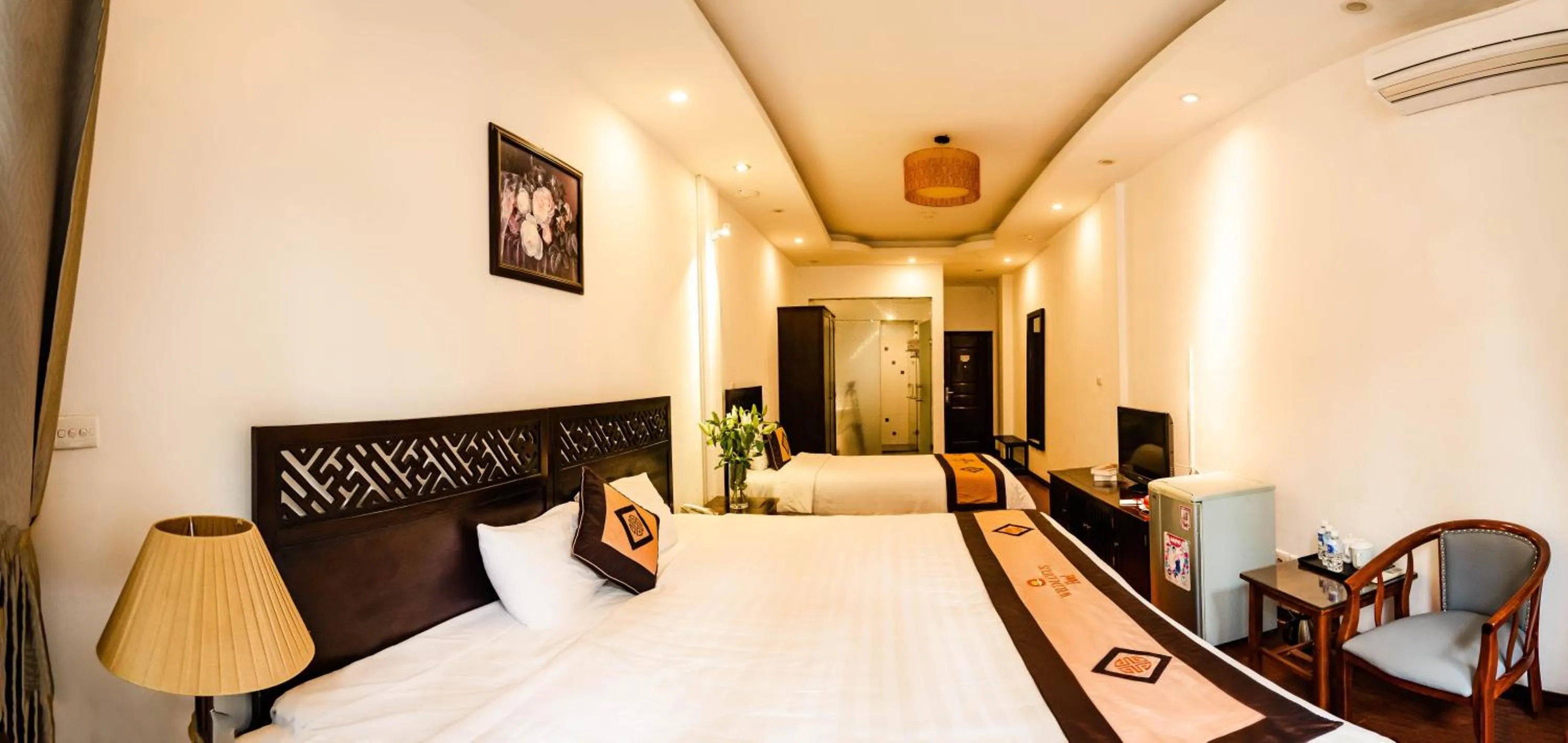 Bed in Wild Lotus Hotel & Travel 2