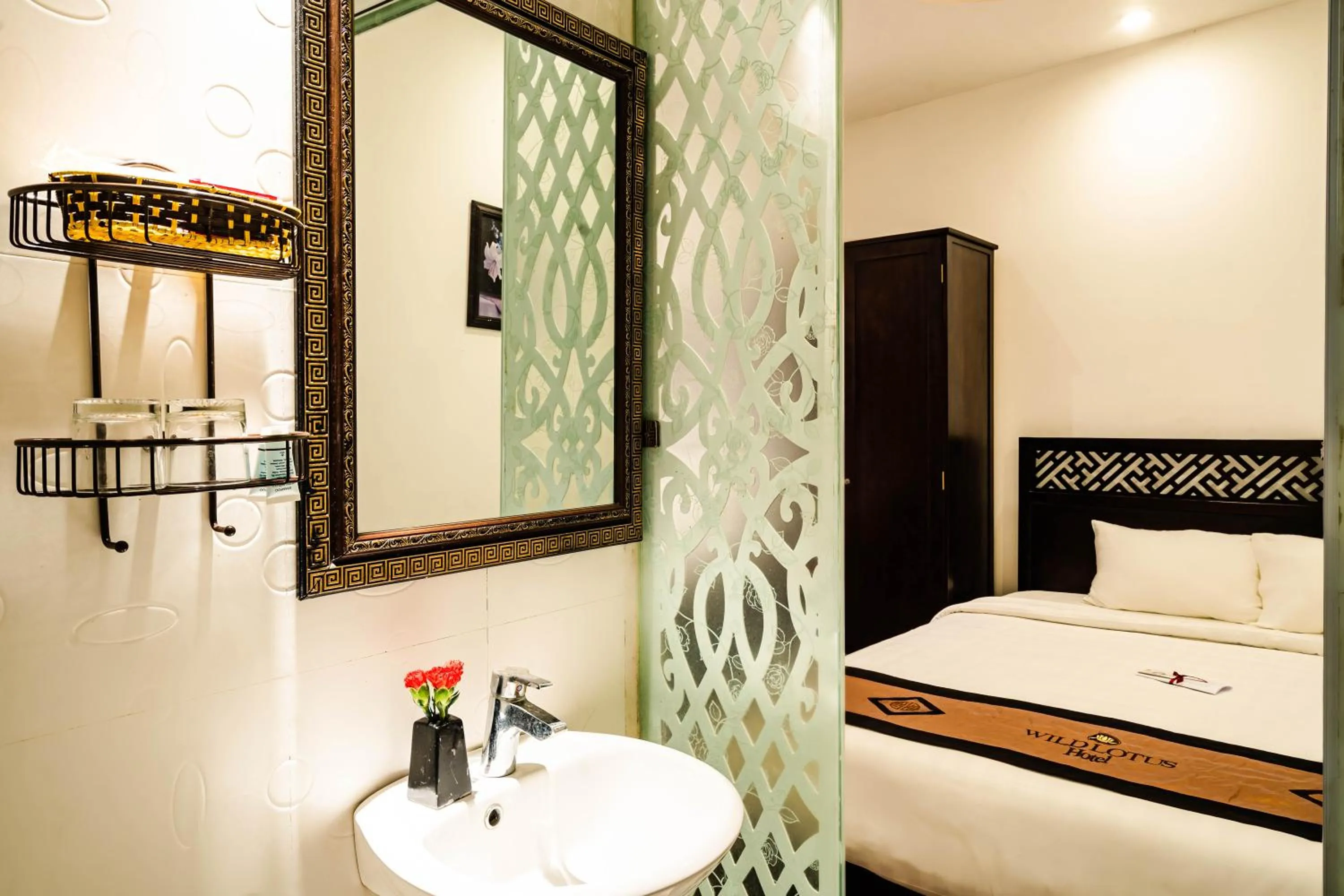 Bed in Wild Lotus Hotel & Travel 2